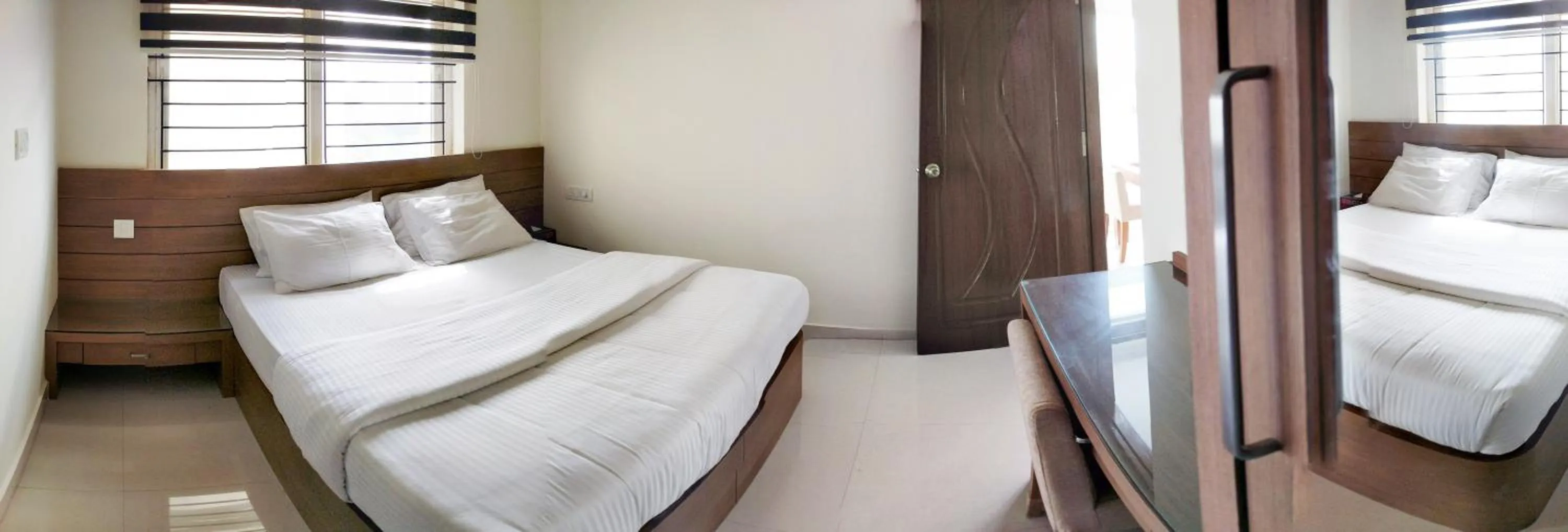 Bed in Clyford Suites