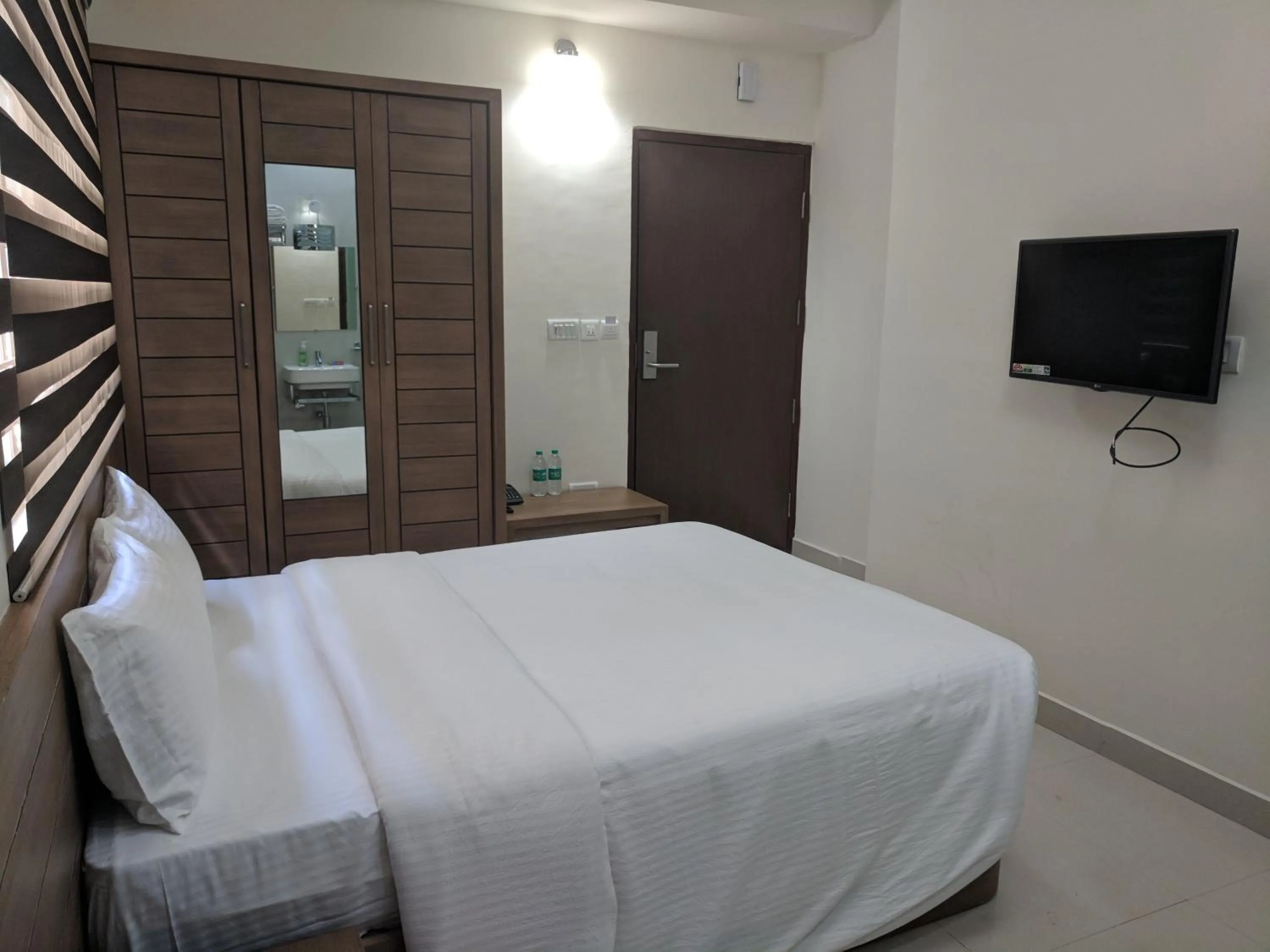 Bed in Clyford Suites