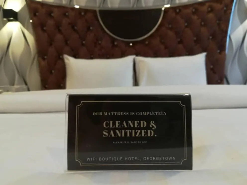 Property logo or sign, Bed in Wifi Boutique Hotel