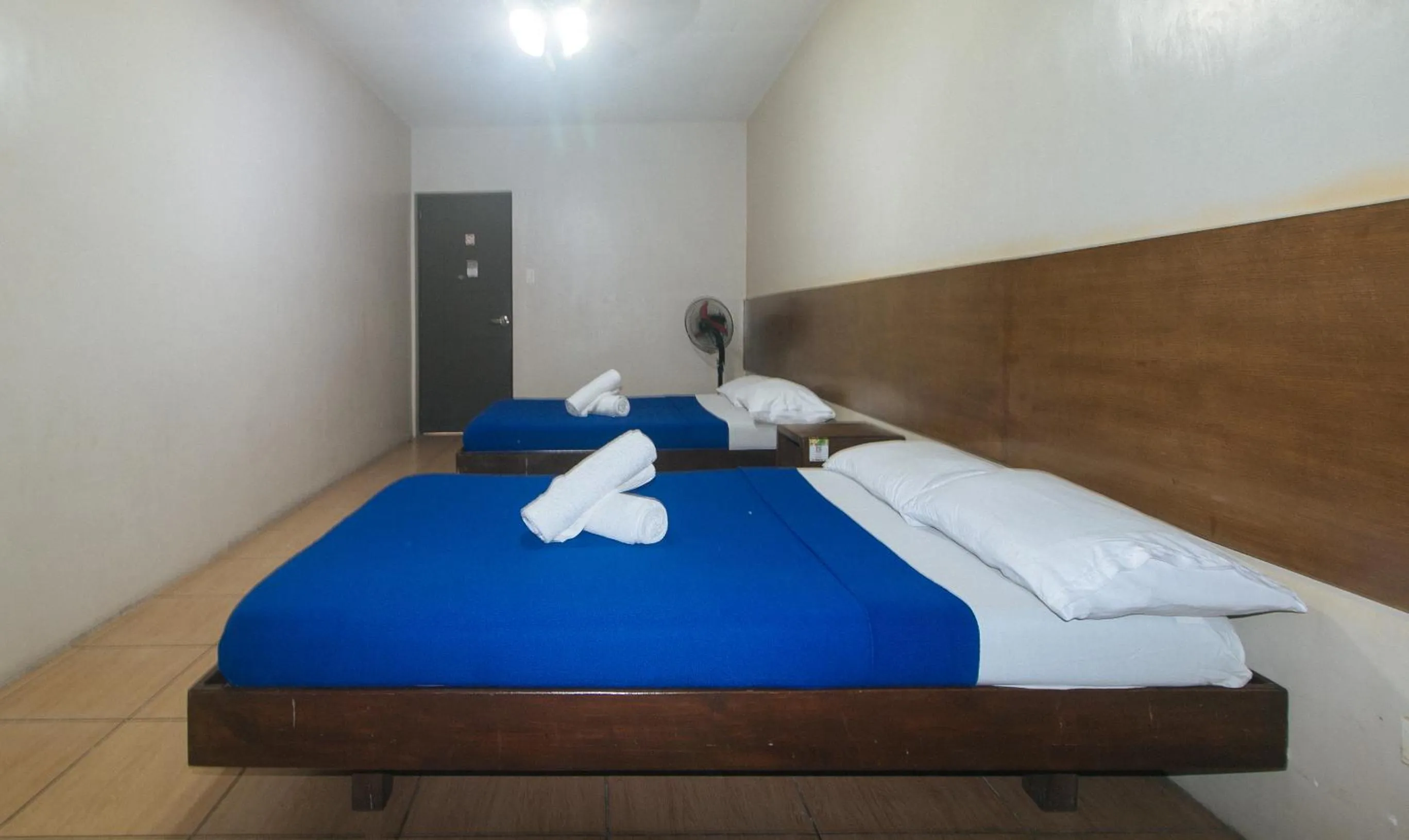 Bed in Metro Deluxe Residences near World Trade Center