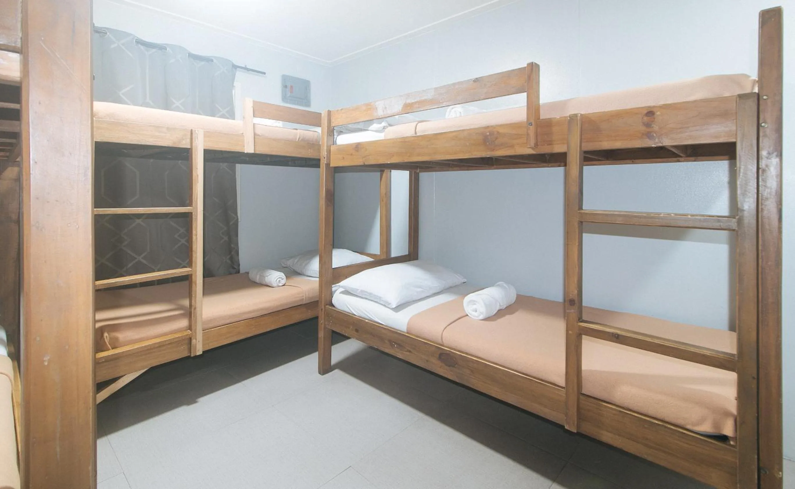 Bed in Metro Deluxe Residences near World Trade Center