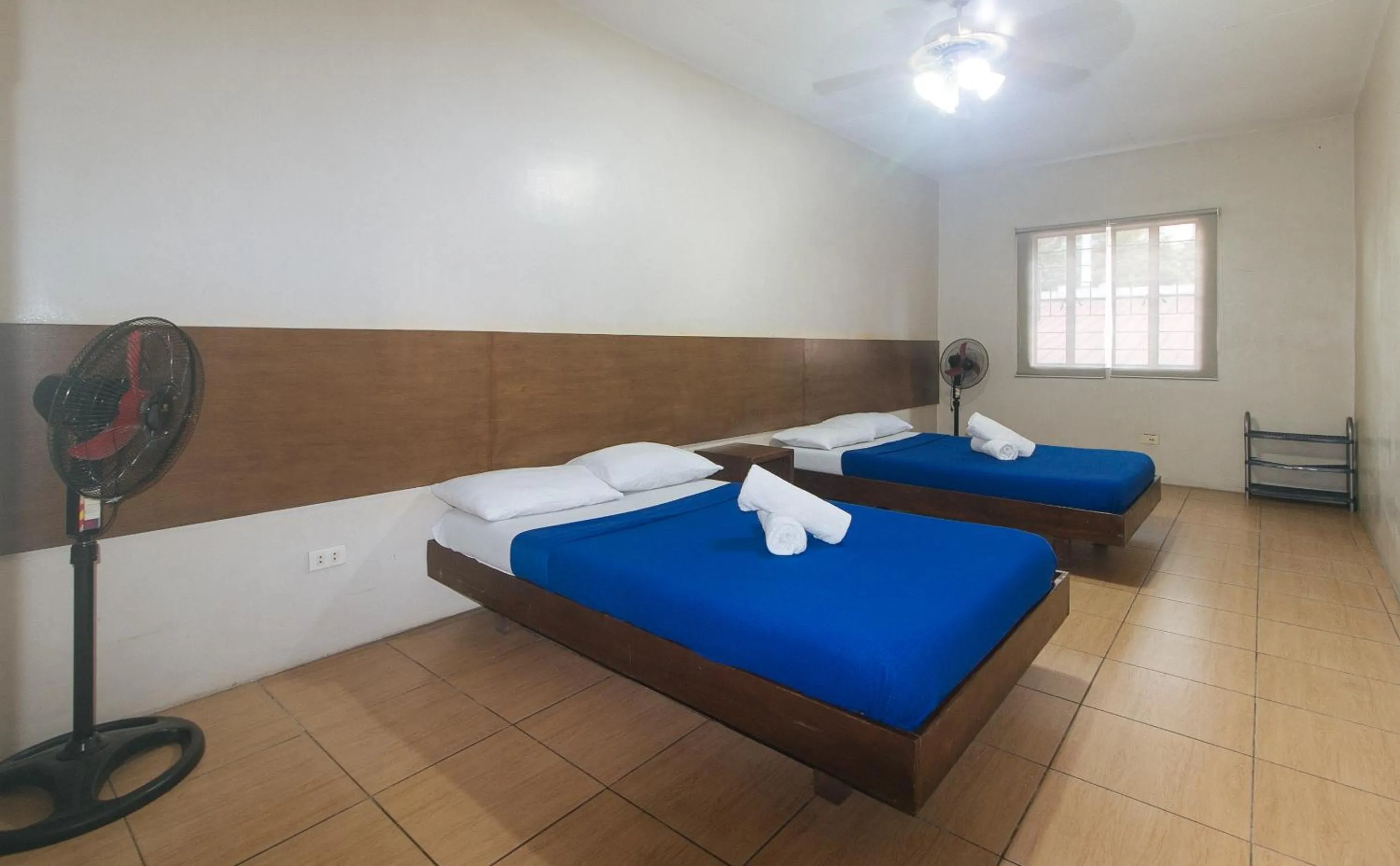 Bed in Metro Deluxe Residences near World Trade Center