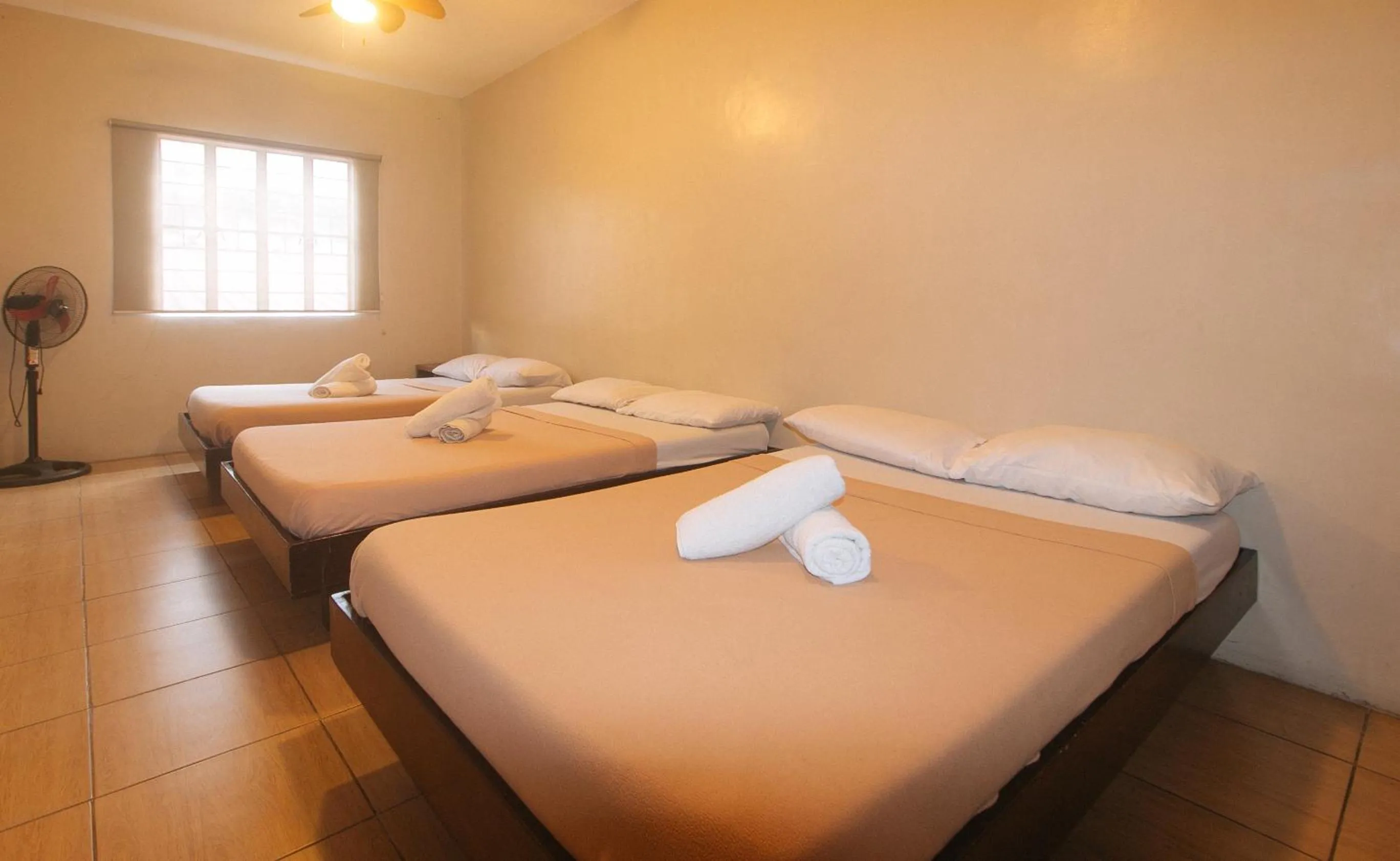 Bed in Metro Deluxe Residences near World Trade Center