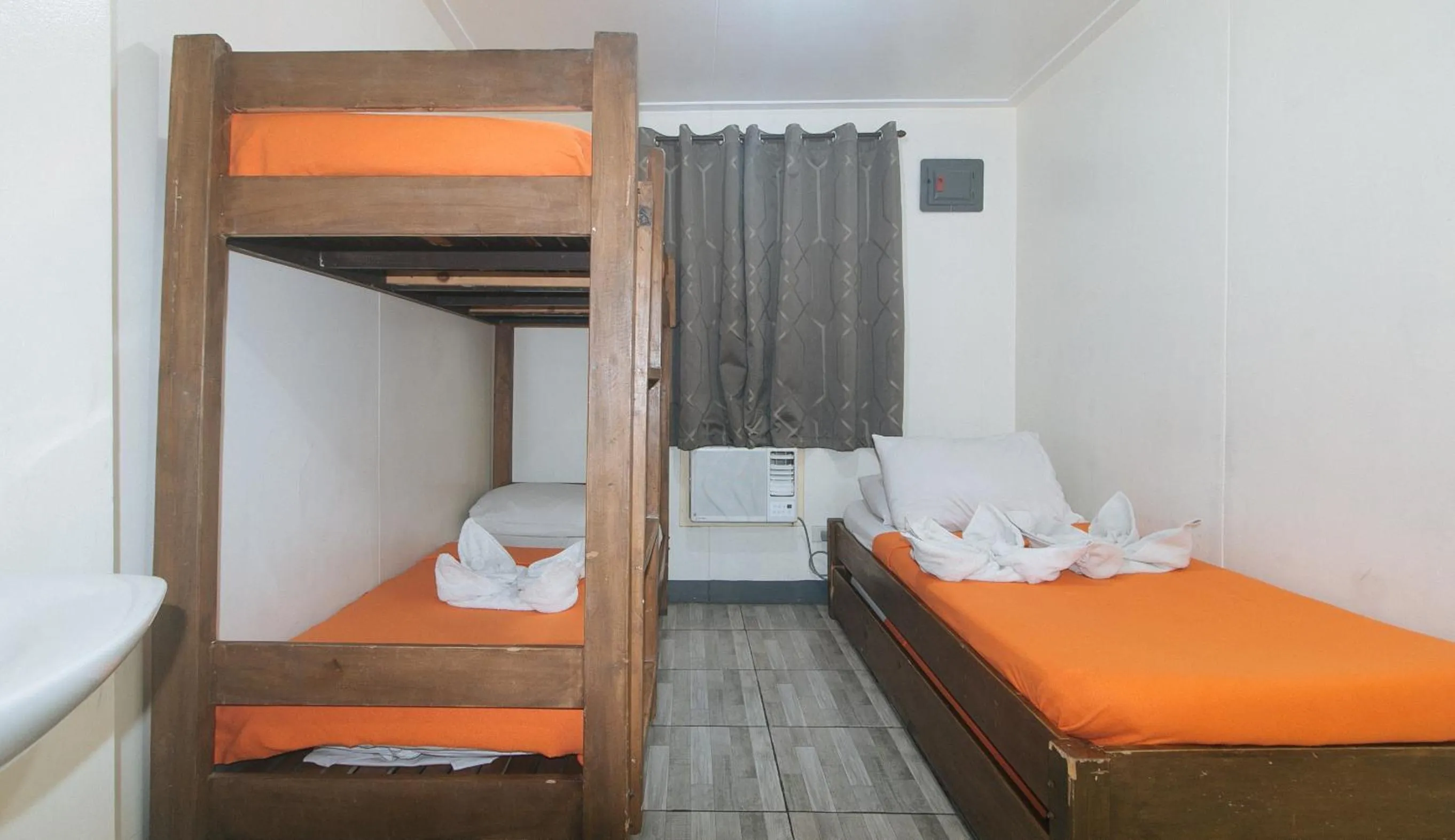 Bed in Metro Deluxe Residences near World Trade Center