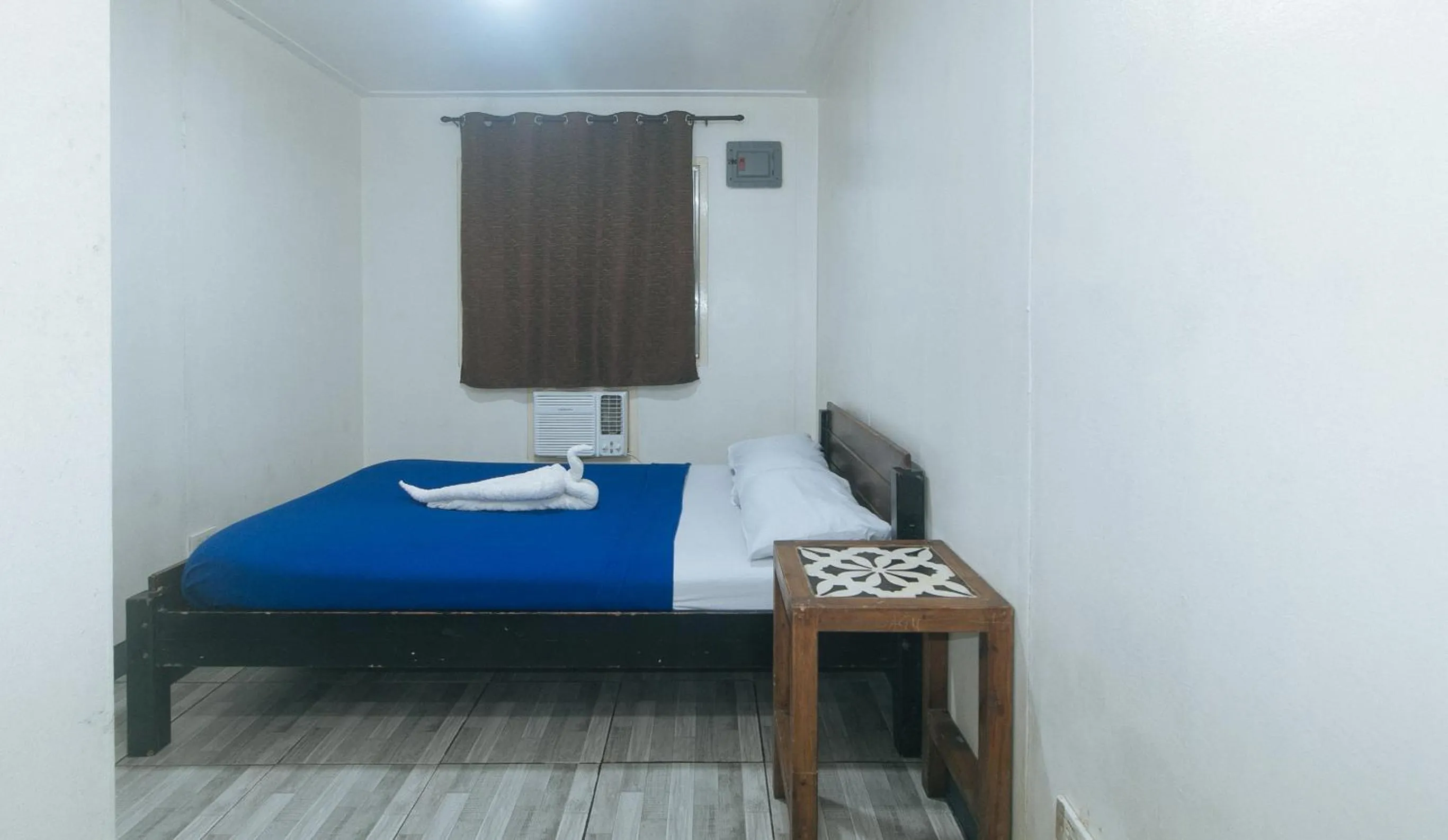 Bed in Metro Deluxe Residences near World Trade Center