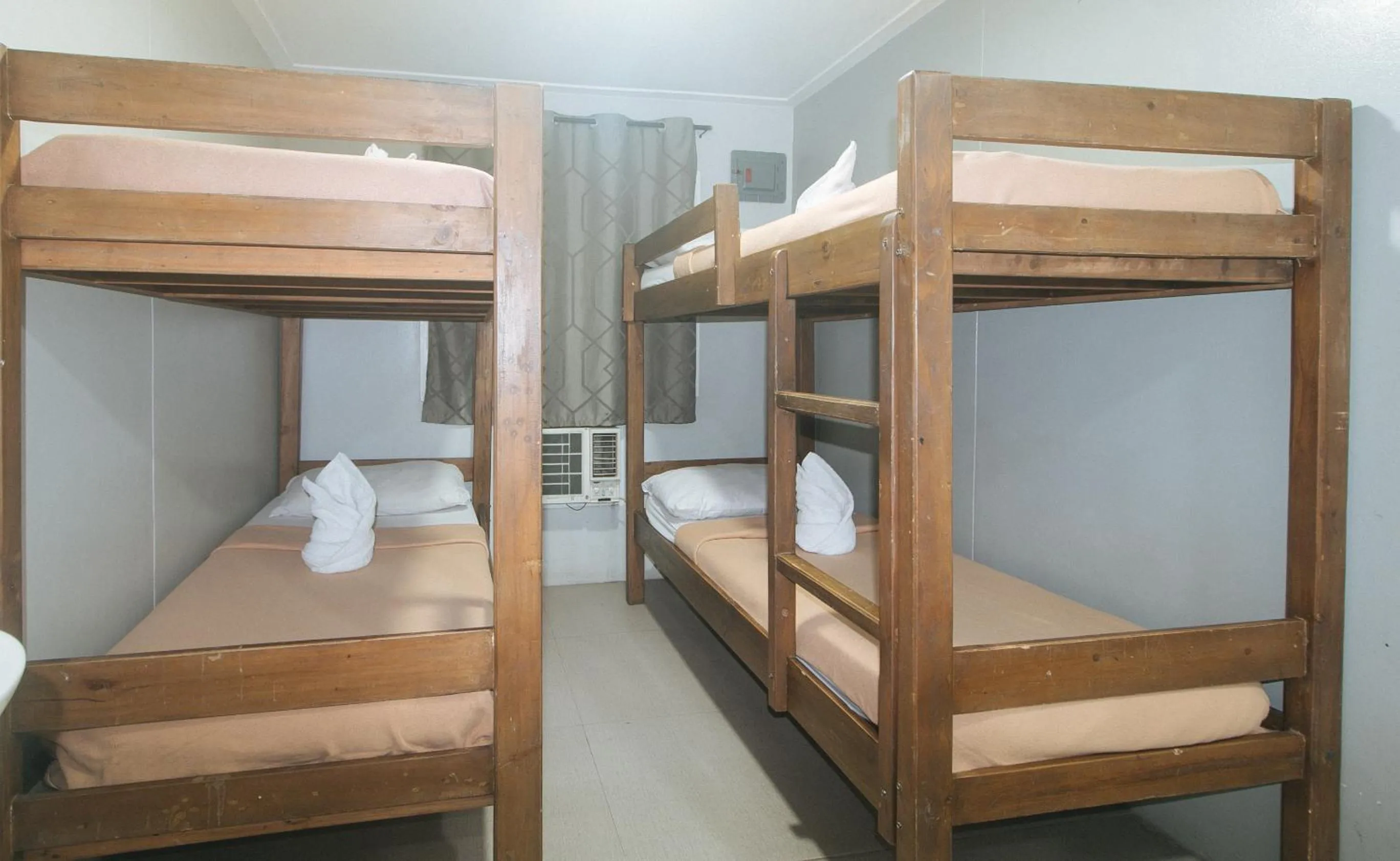 Bed in Metro Deluxe Residences near World Trade Center