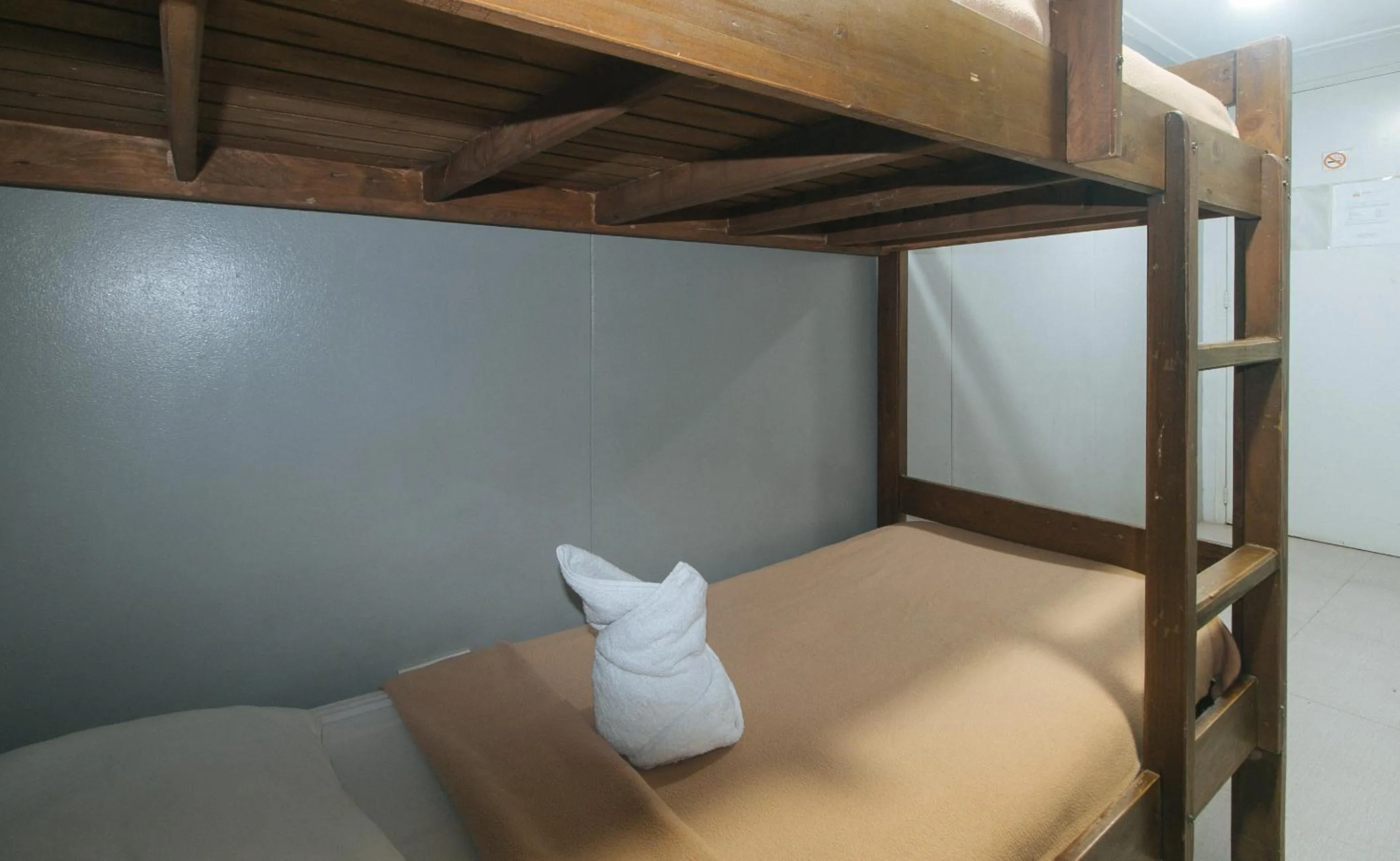 Bed in Metro Deluxe Residences near World Trade Center