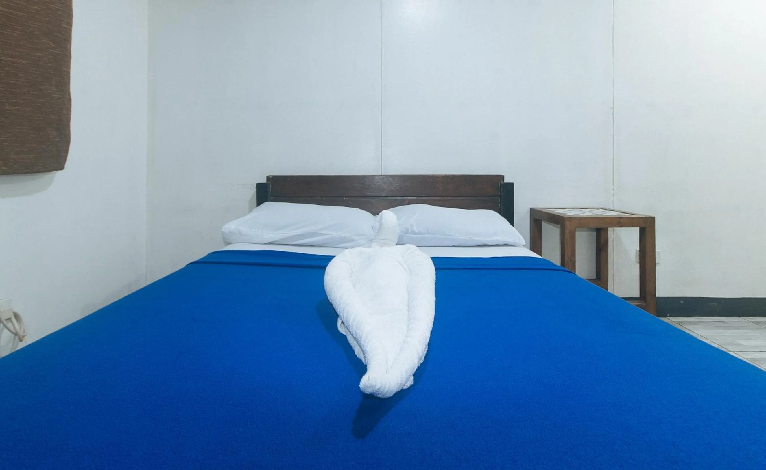 Bed in Metro Deluxe Residences near World Trade Center