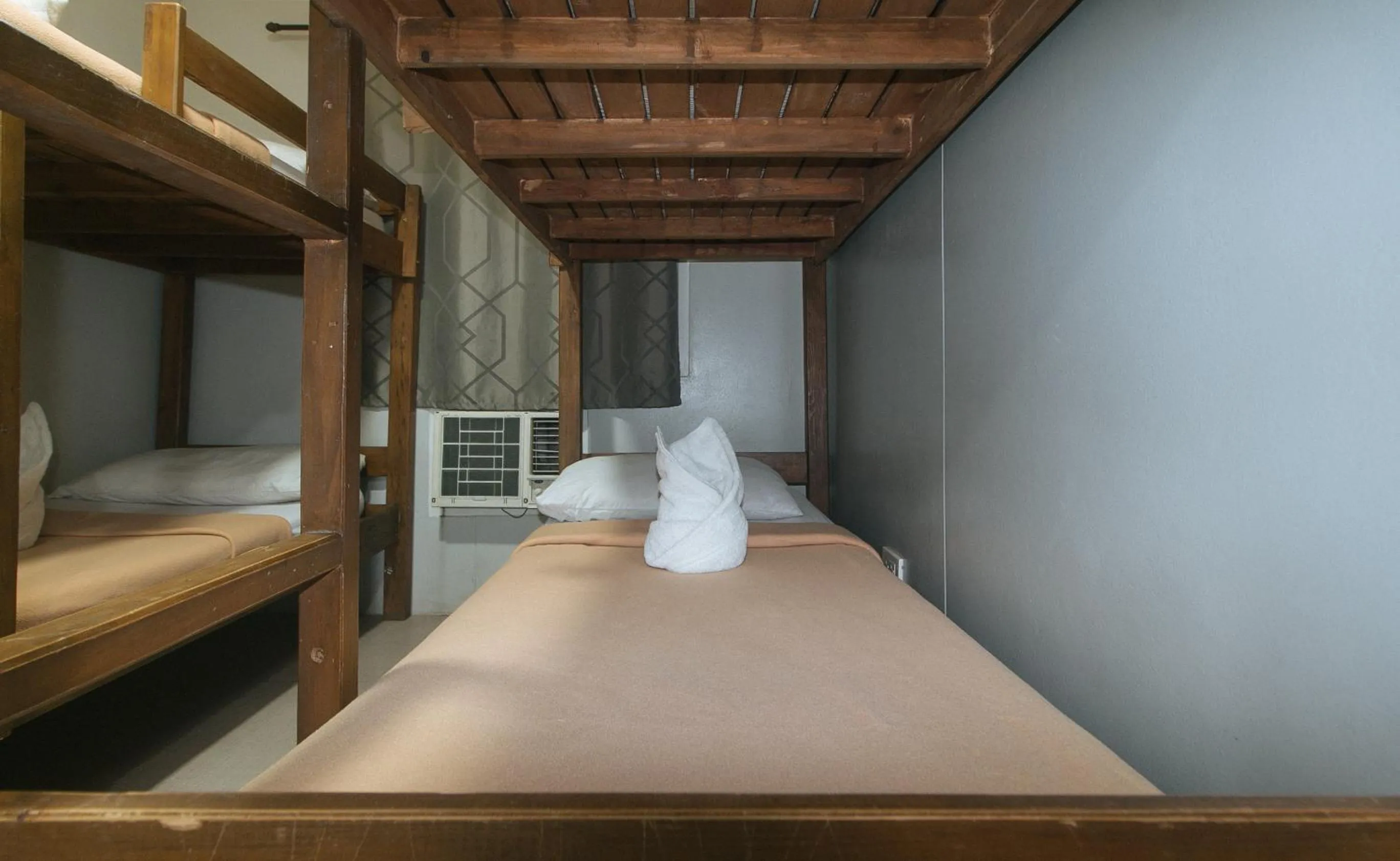 Bed in Metro Deluxe Residences near World Trade Center