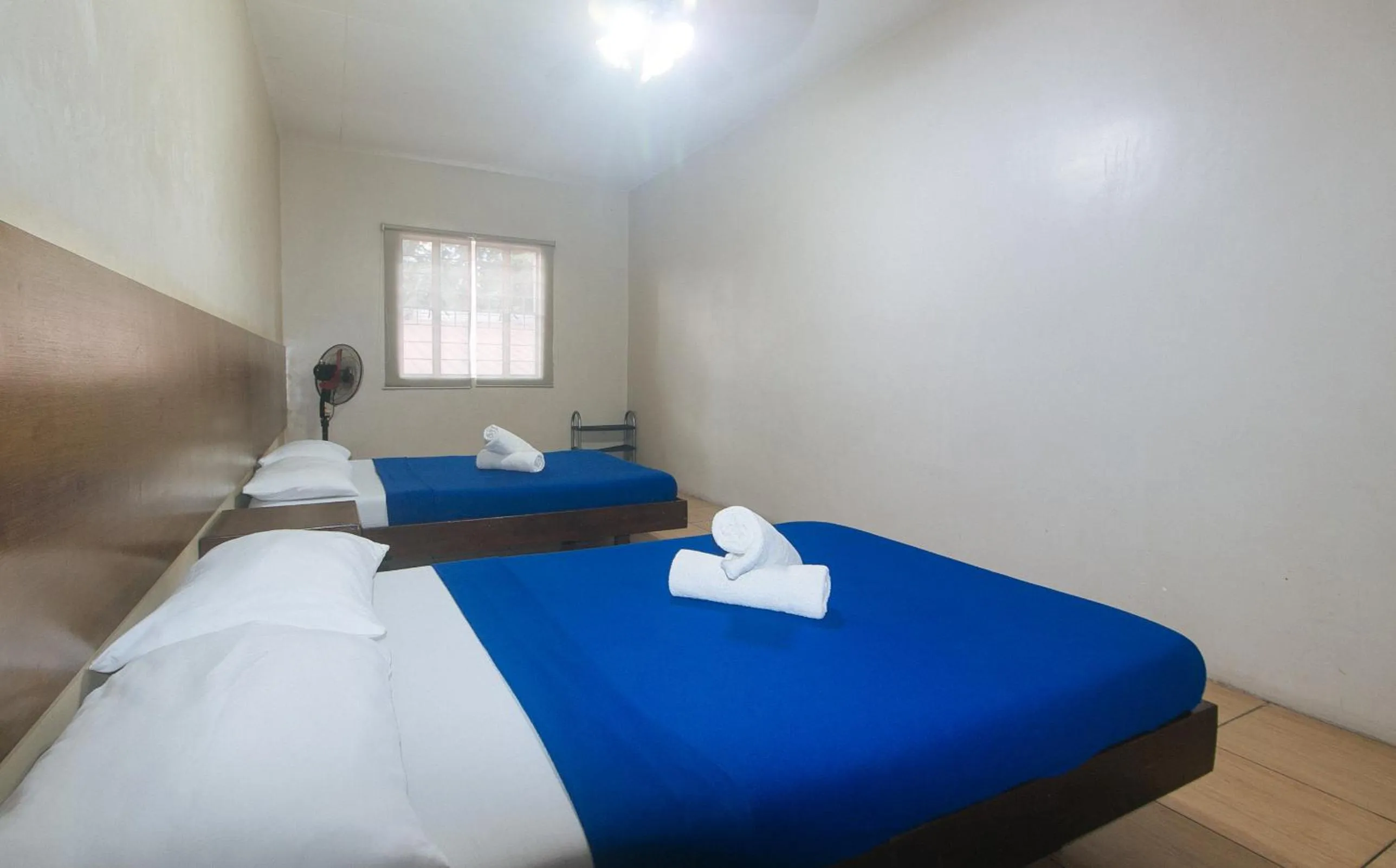 Bed in Metro Deluxe Residences near World Trade Center