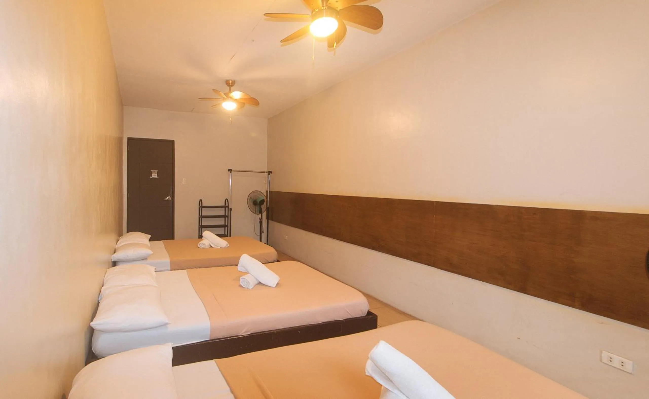 Bed in Metro Deluxe Residences near World Trade Center