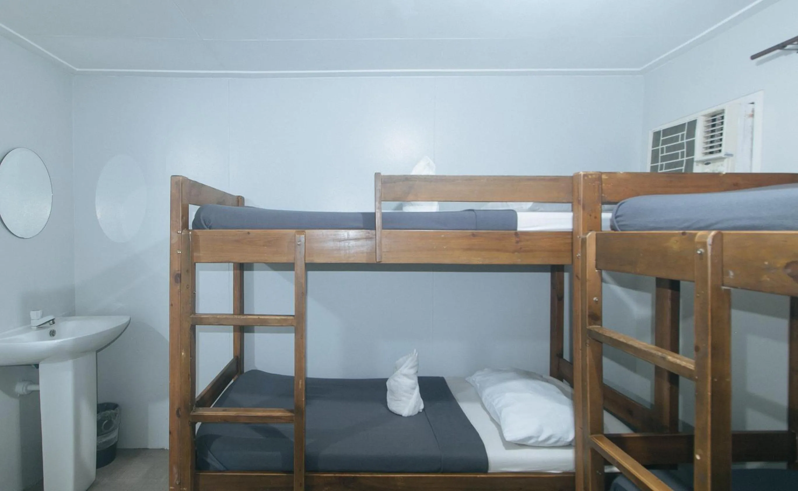 Bed in Metro Deluxe Residences near World Trade Center