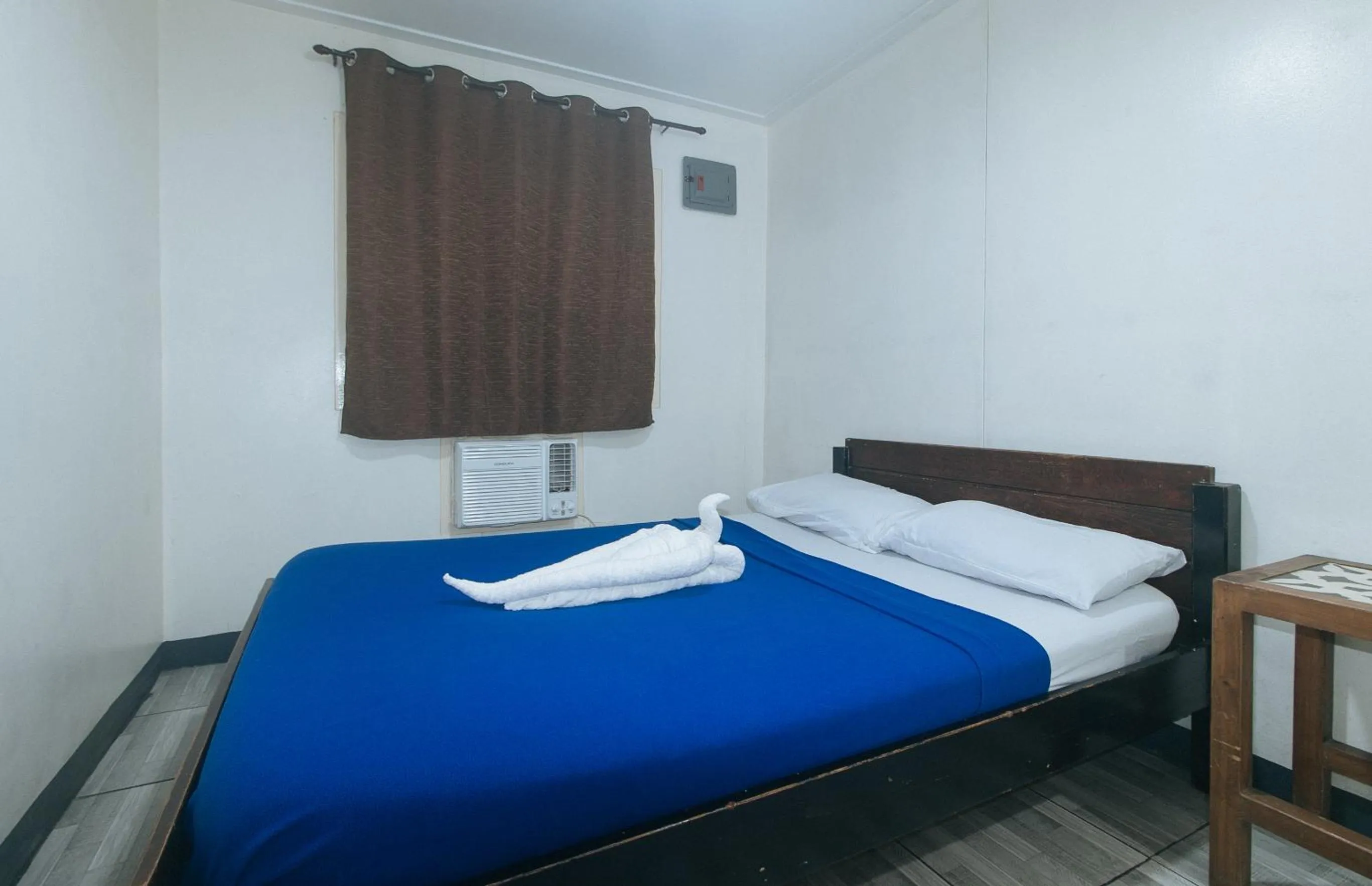 Bed in Metro Deluxe Residences near World Trade Center