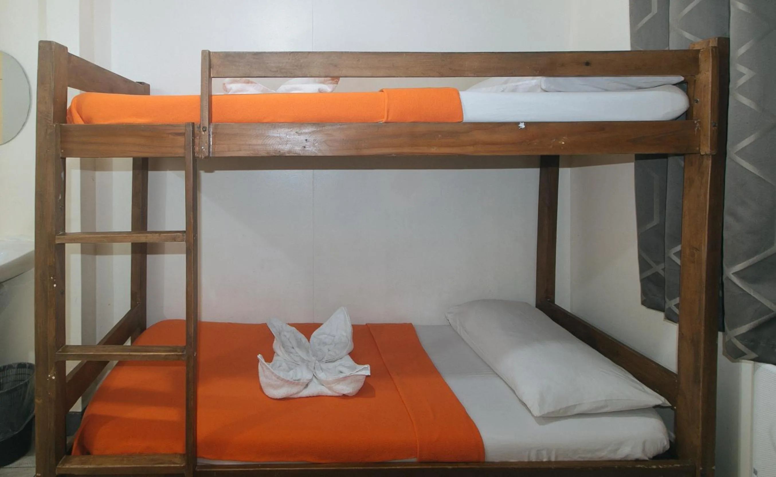 Bed in Metro Deluxe Residences near World Trade Center