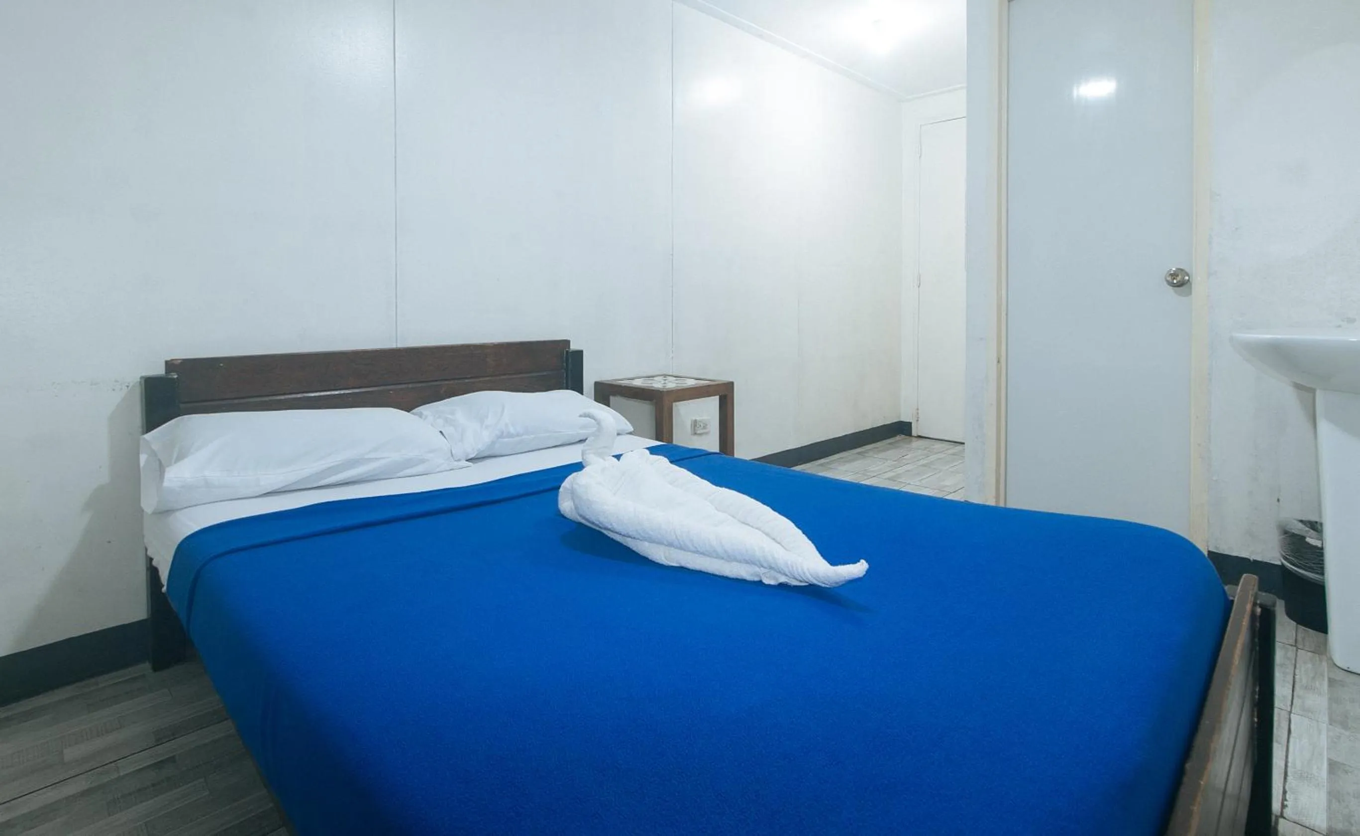 Bed in Metro Deluxe Residences near World Trade Center