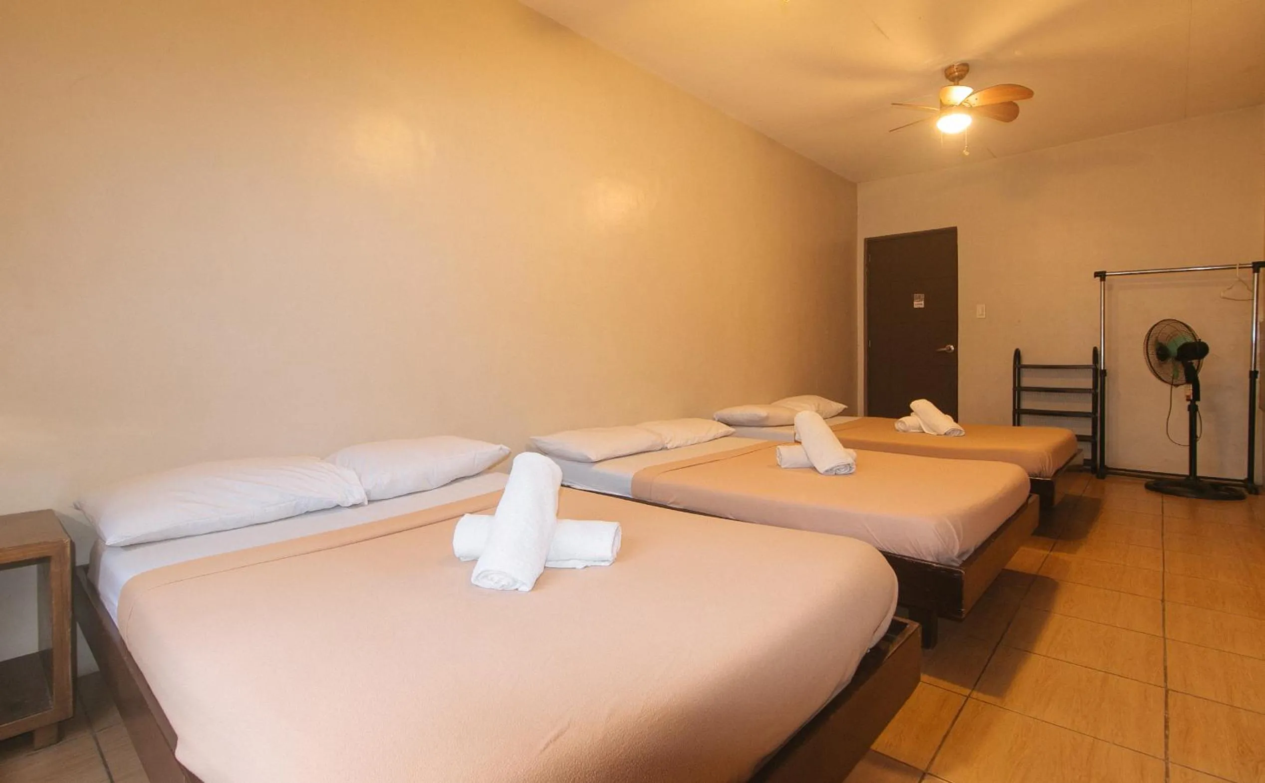 Bed in Metro Deluxe Residences near World Trade Center