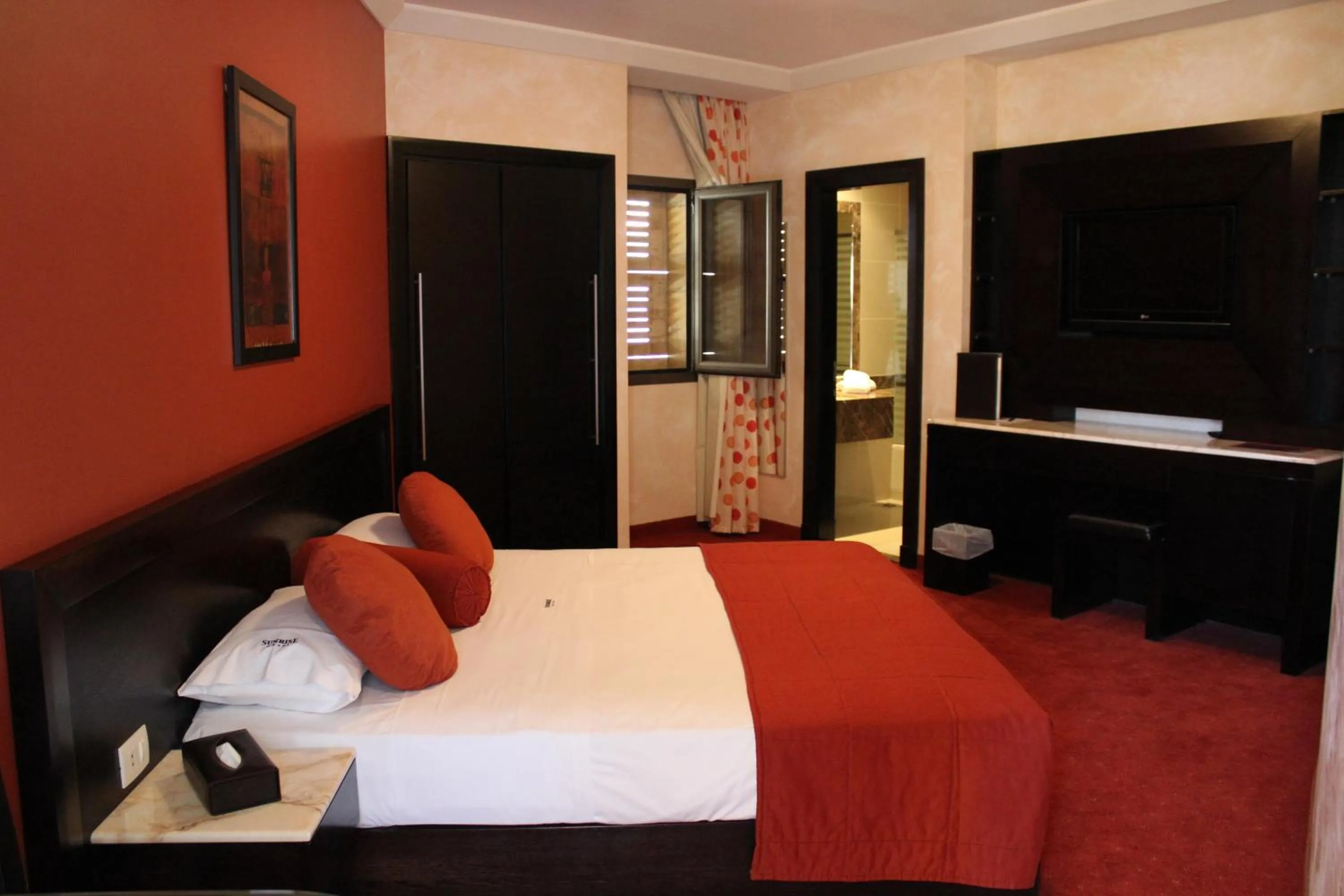 Bed in Sunrise Hotel