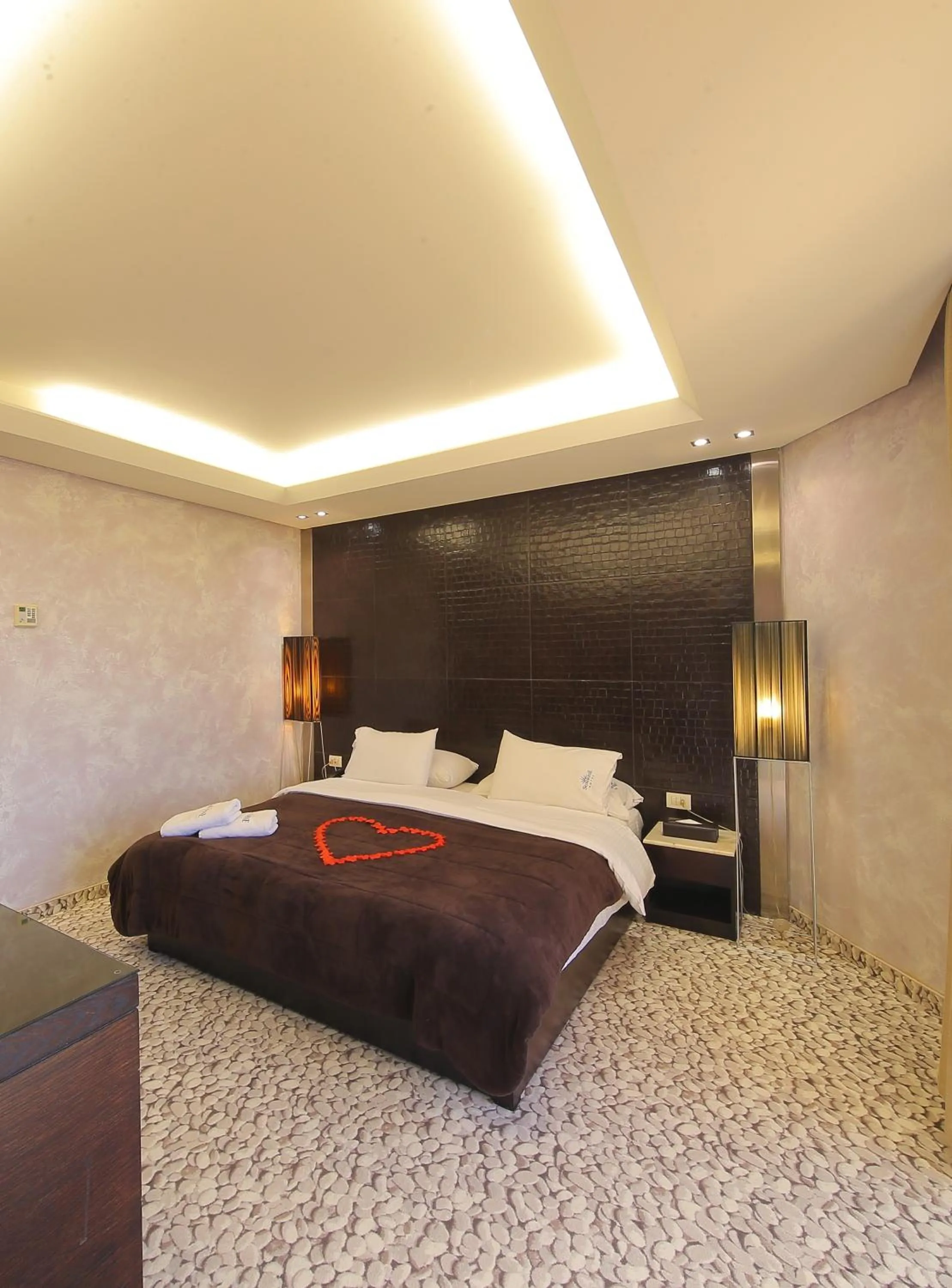 Bed in Sunrise Hotel