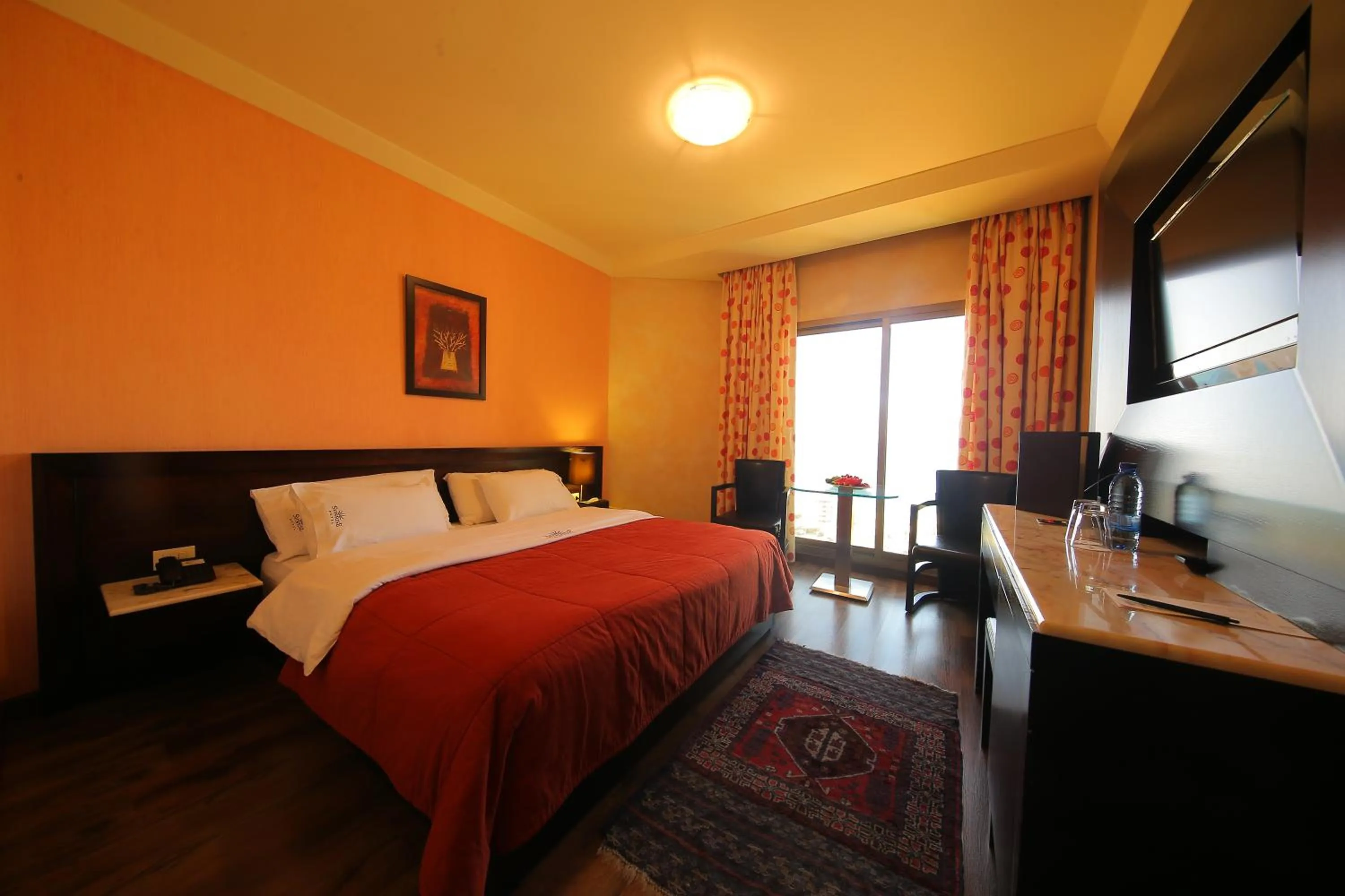 Bed in Sunrise Hotel