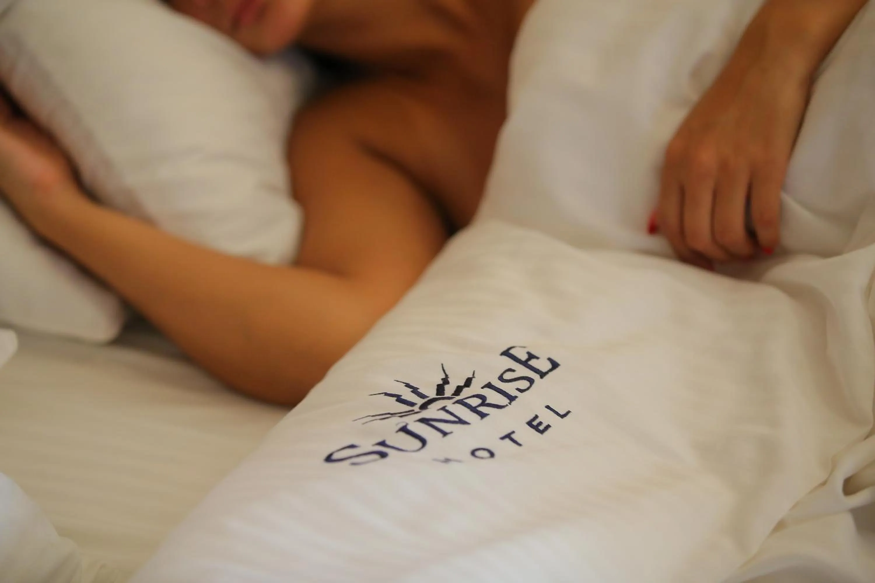 Bed in Sunrise Hotel