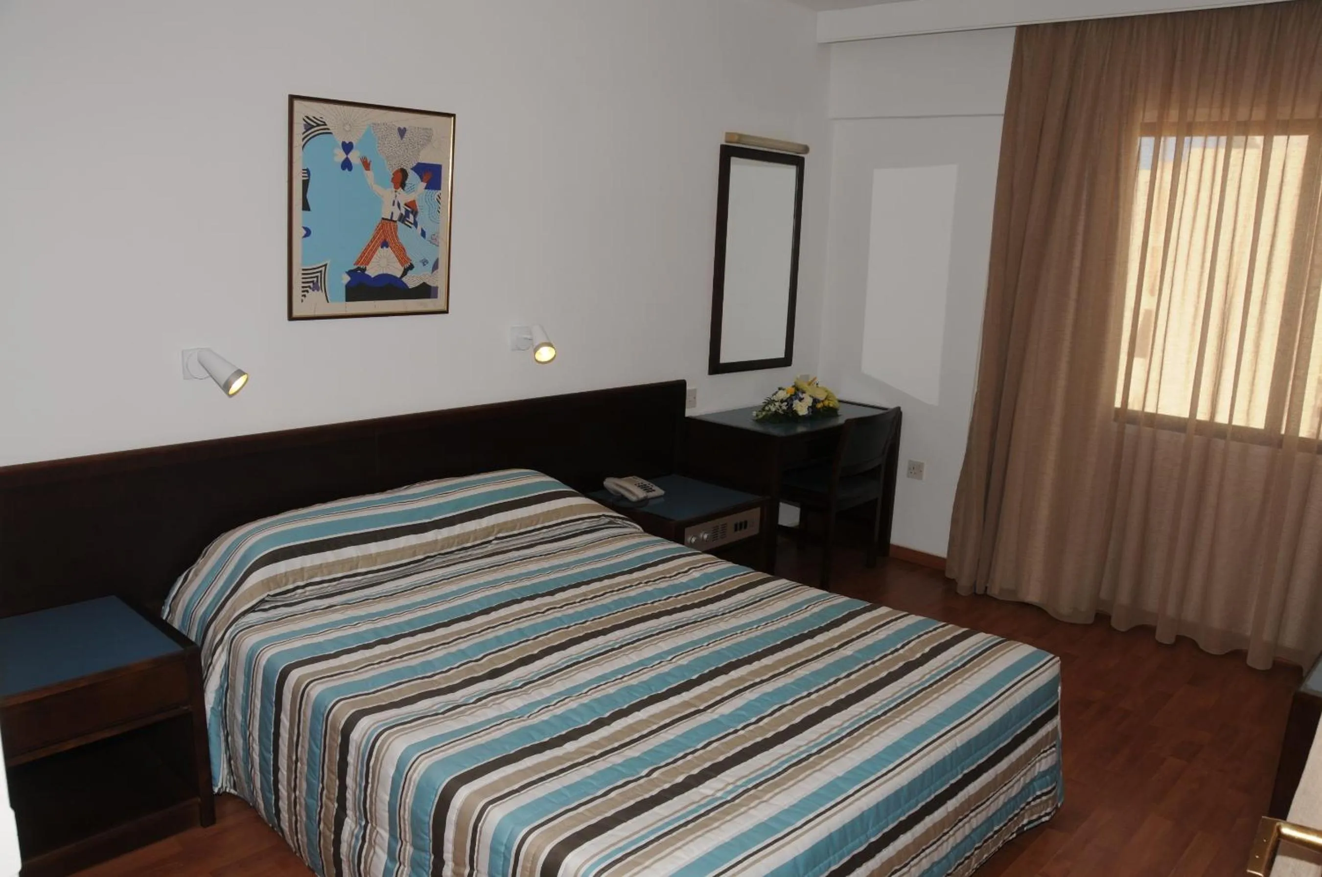 Bed in Atrium Zenon Hotel Apartments