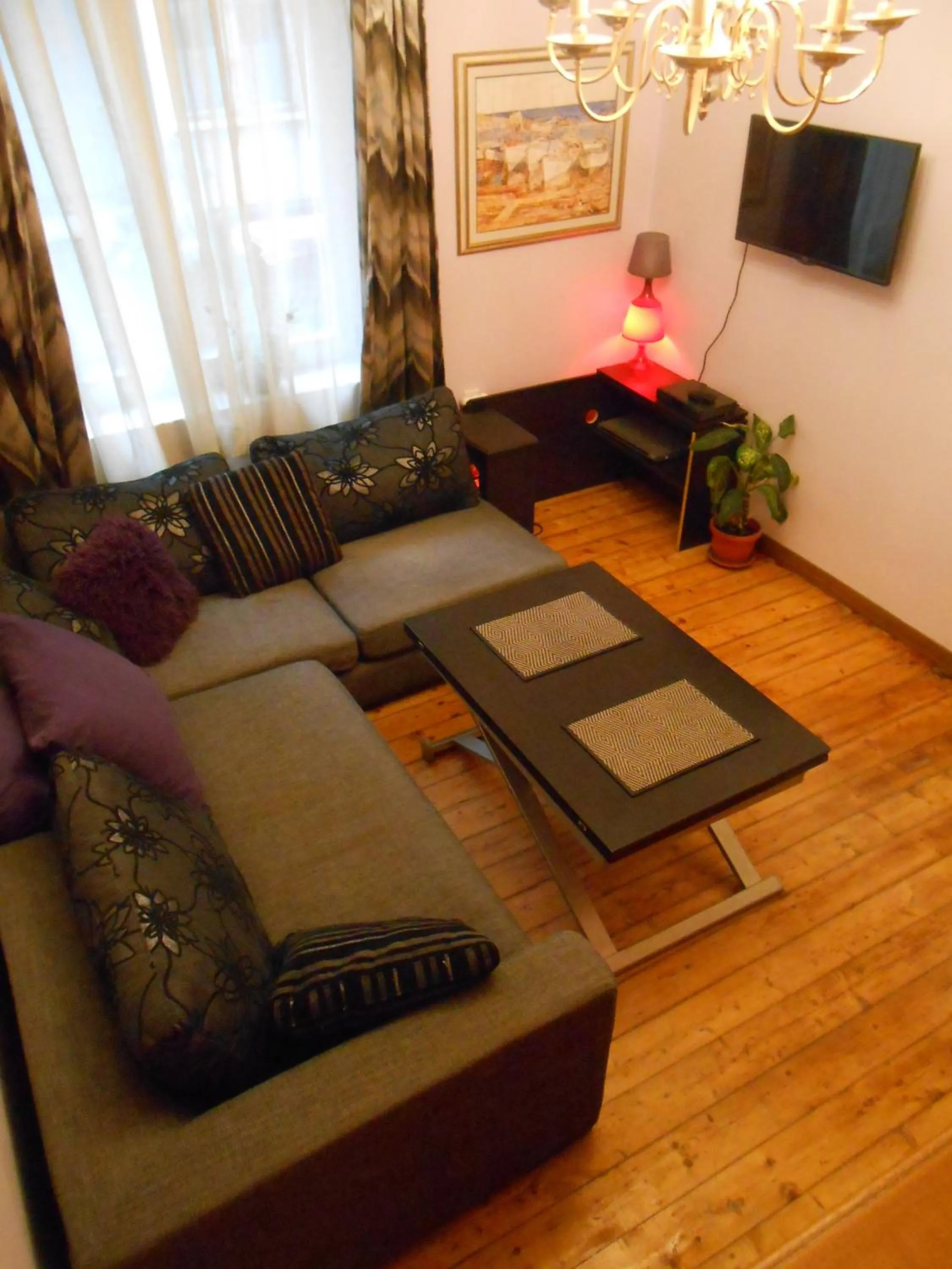 Communal lounge/ TV room in Orient Express Guest House