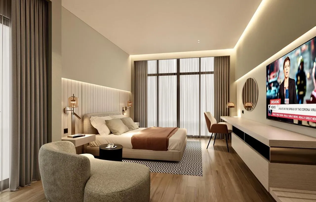 Bed in ParkTower Suites