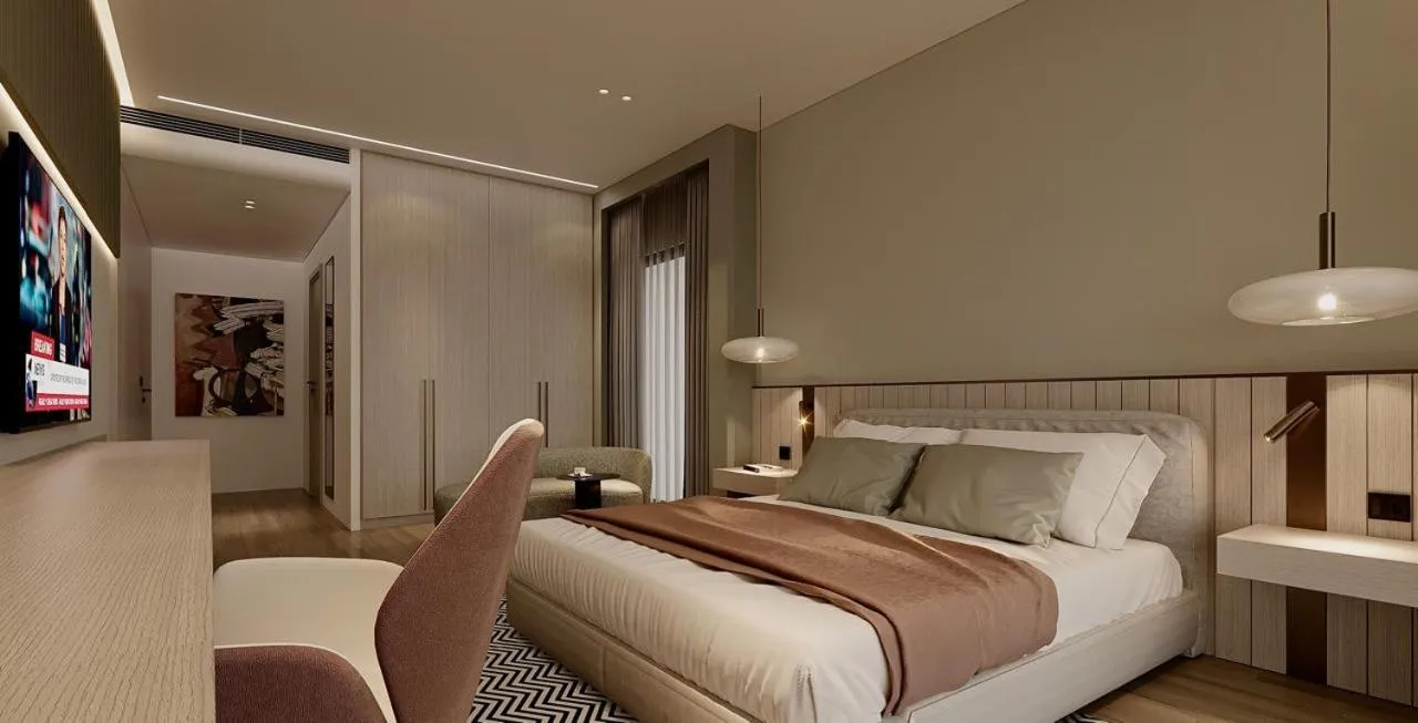 Bed in ParkTower Suites