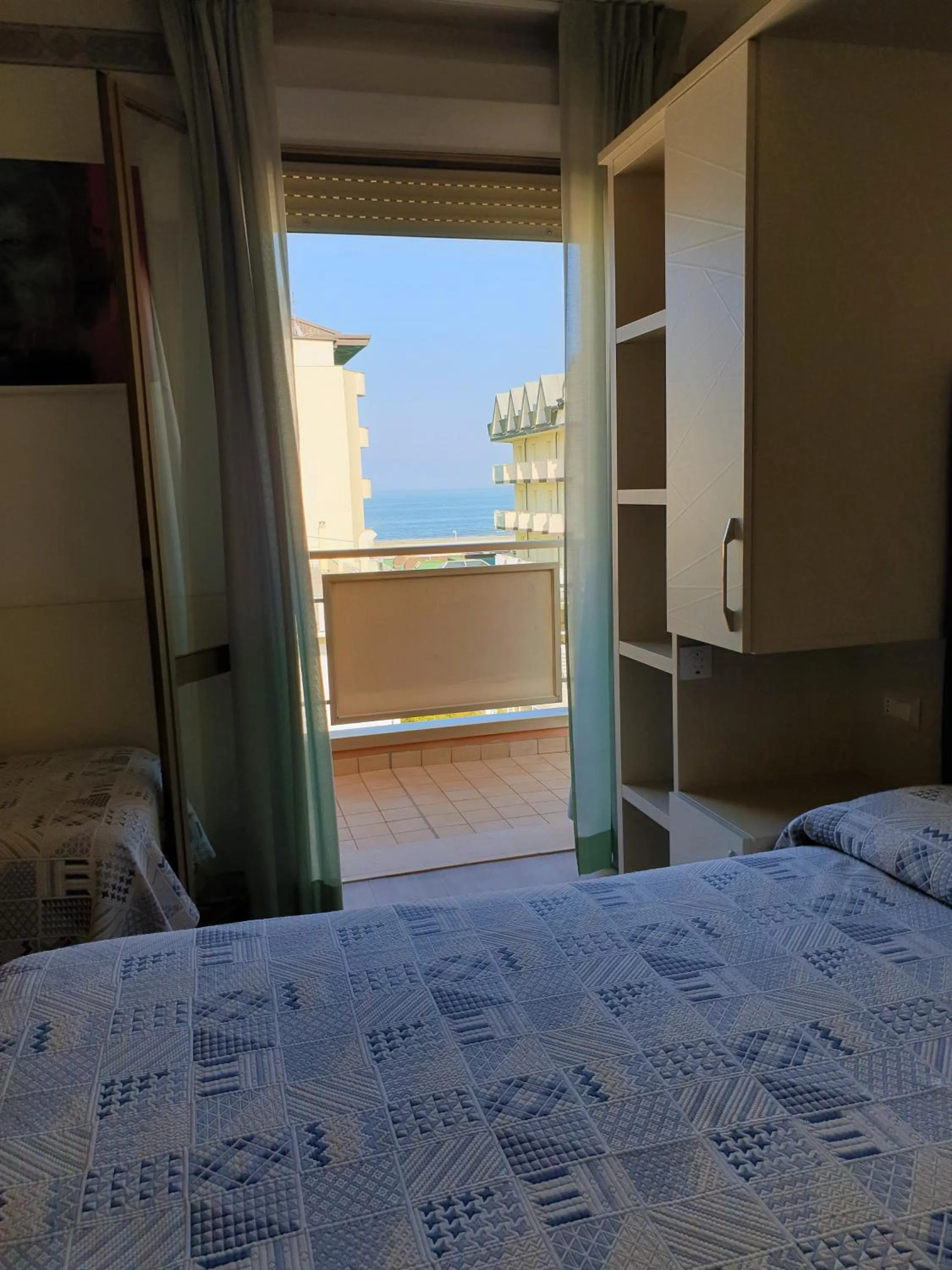 View (from property/room), Bed in Hotel Losanna Cervia