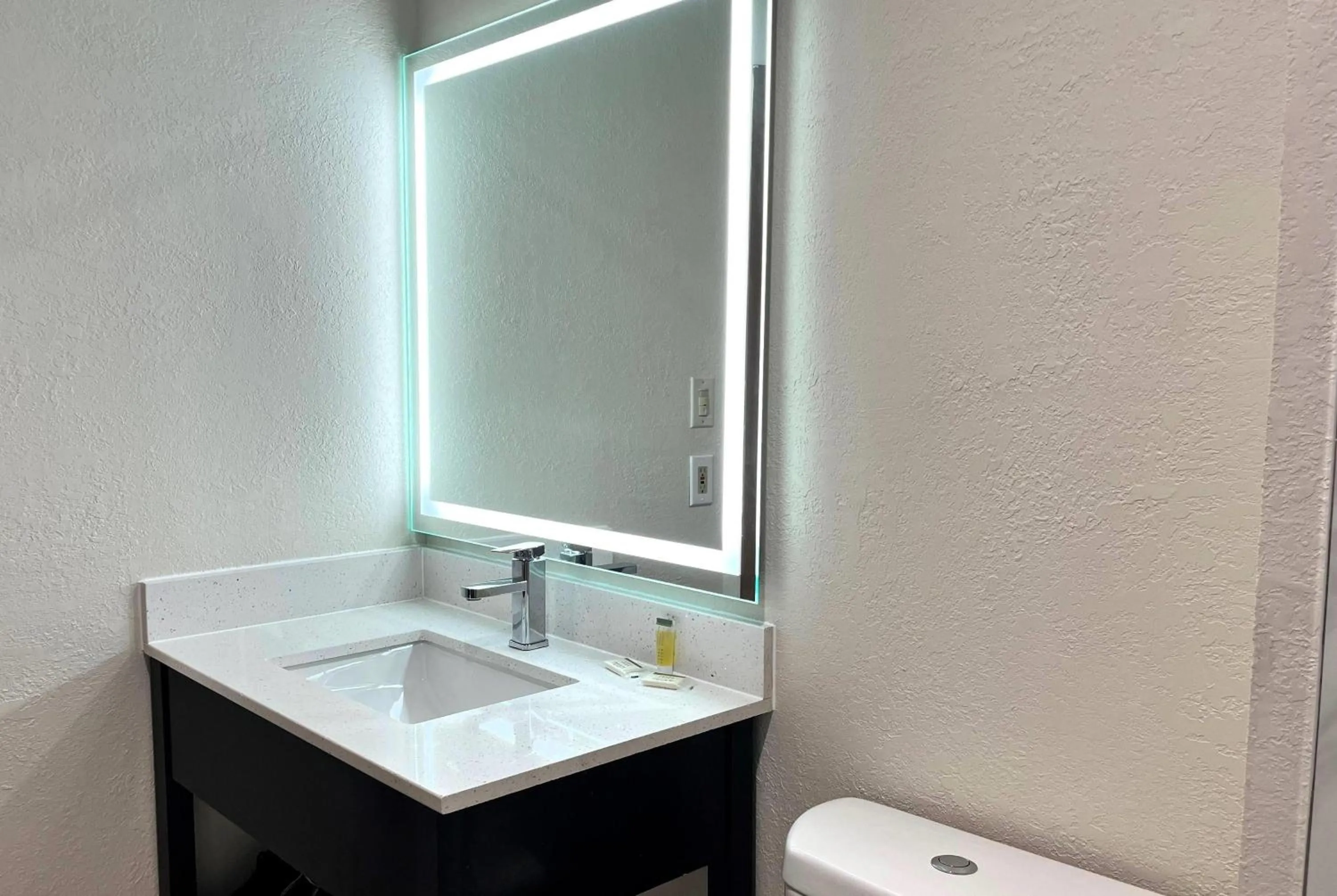 Bathroom in Baymont by Wyndham Cincinnati Sharonville