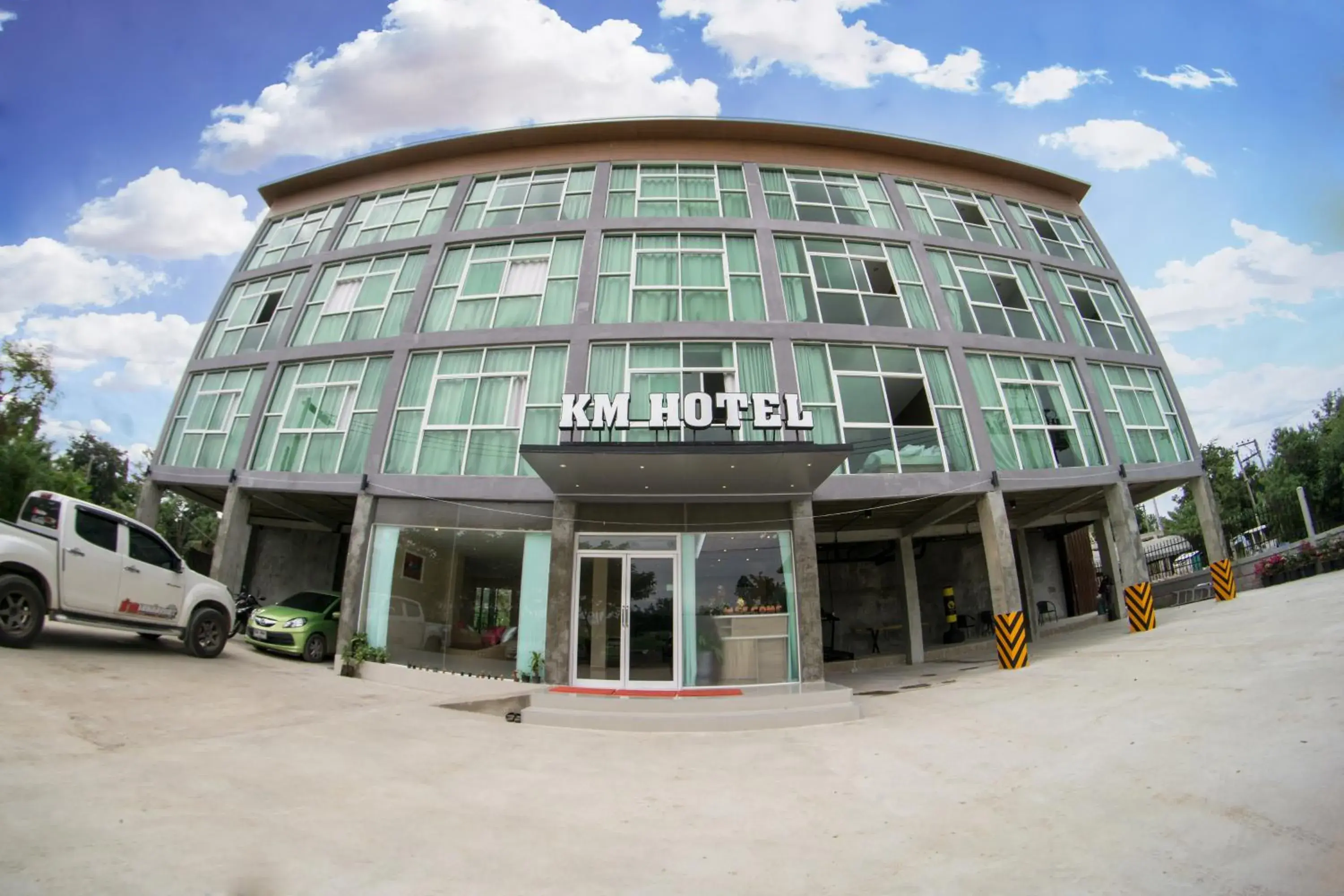 Property building in Km Hotel Chiang Mai Property building in Km Hotel Chiang Mai