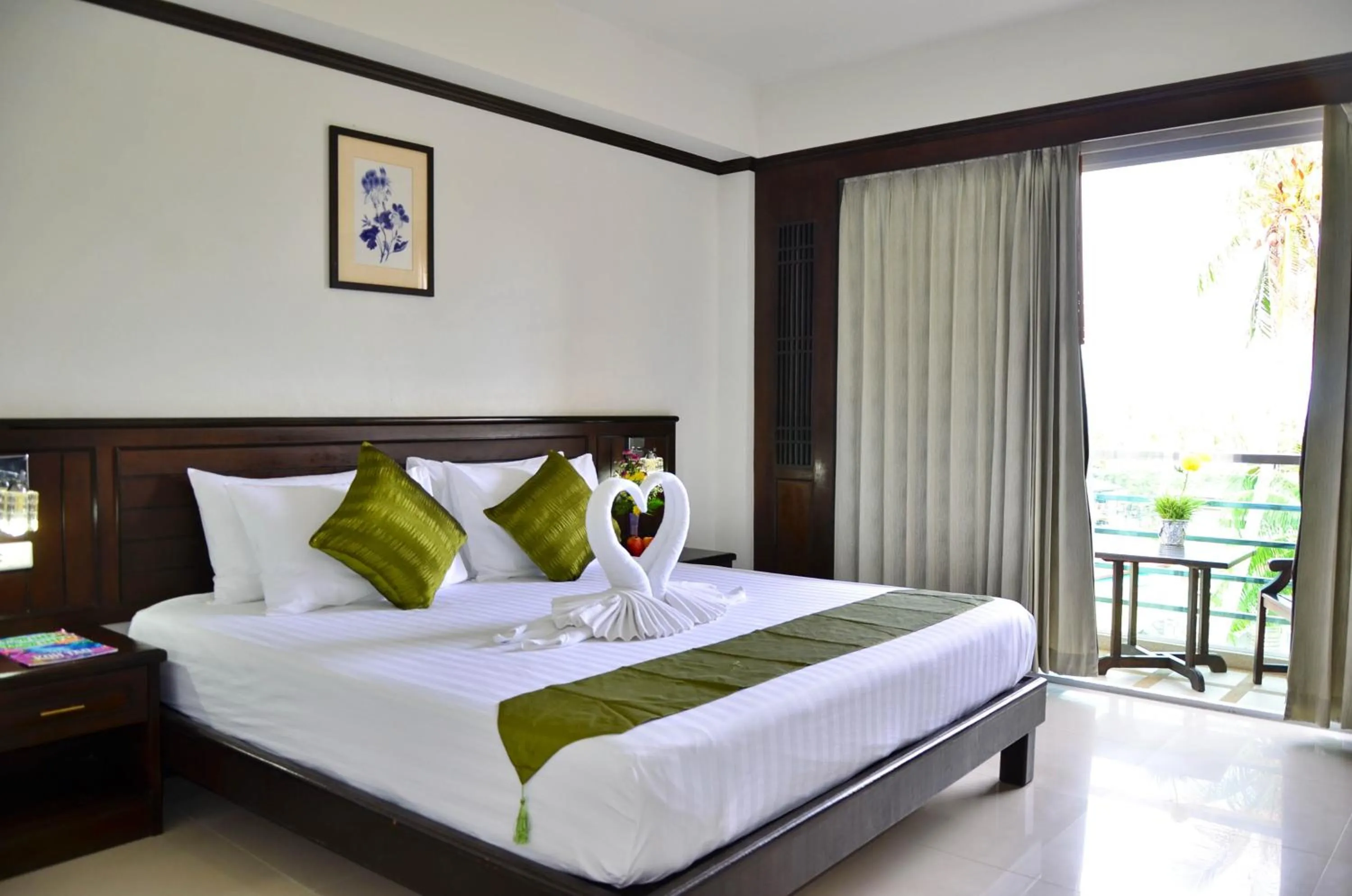 Bed in First Residence Hotel