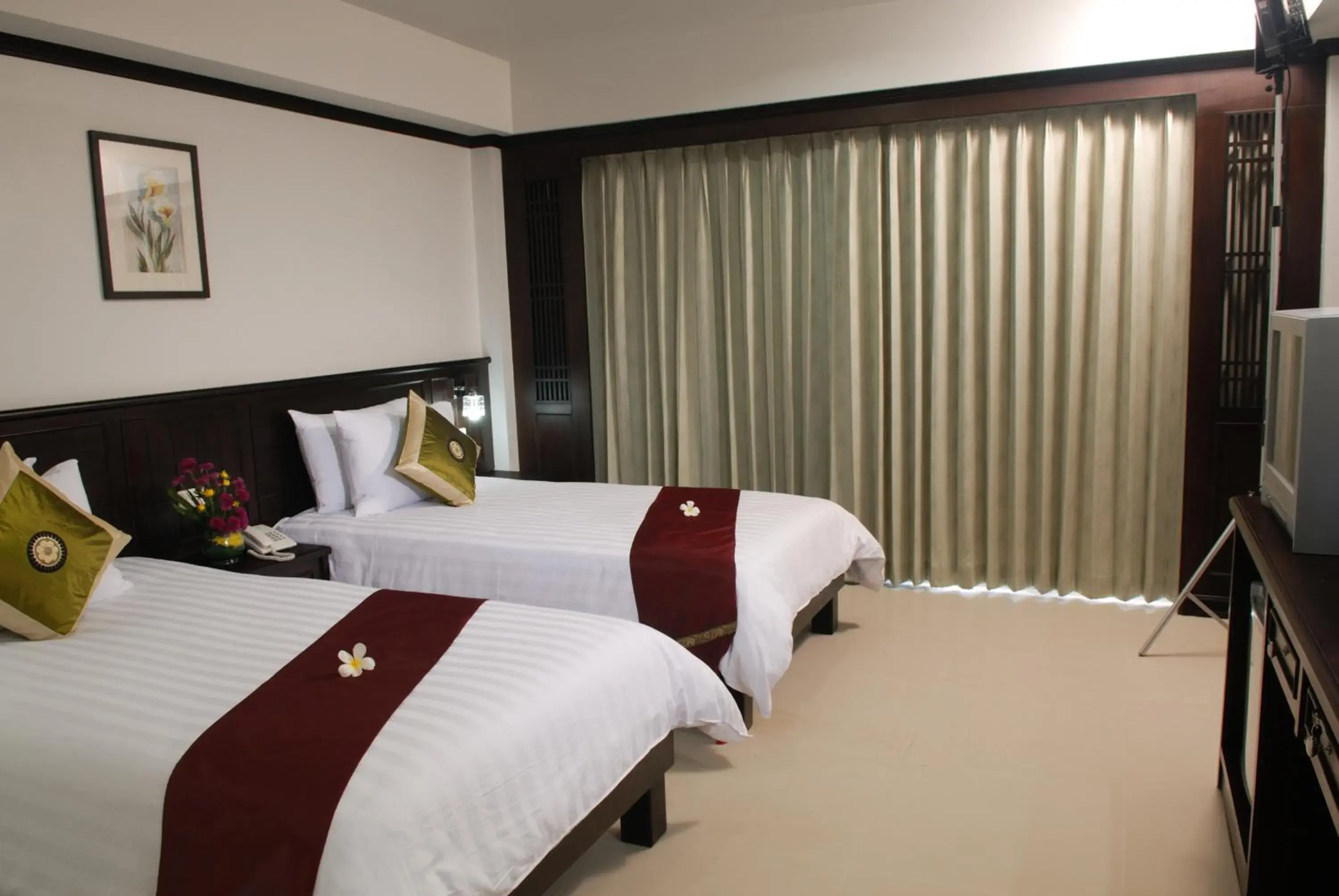 Bed in First Residence Hotel Bed in First Residence Hotel