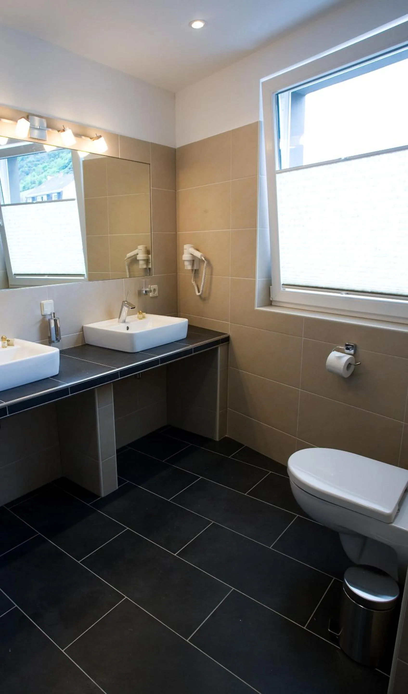 Bathroom in Hotel La Baia
