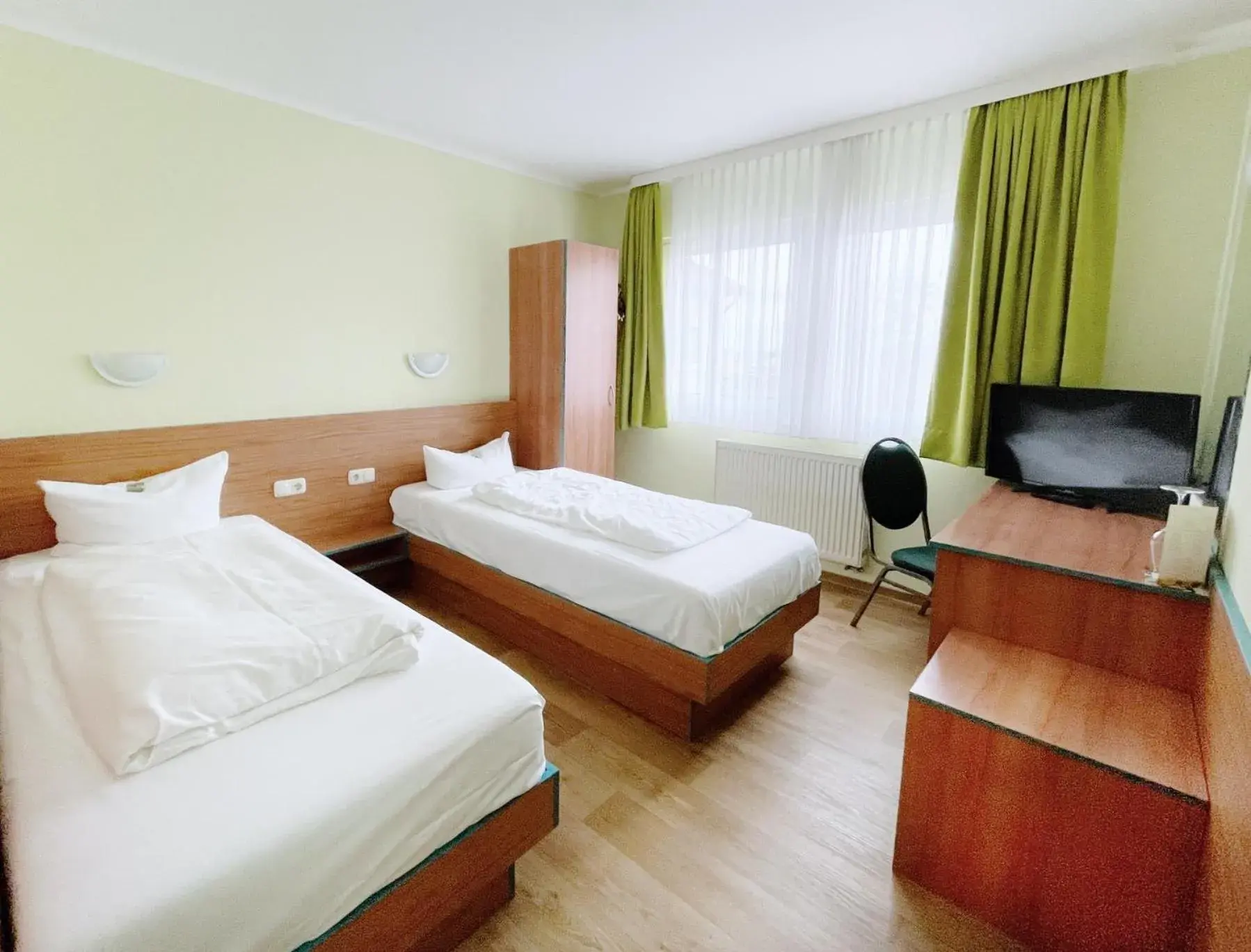 Bed in REGIOHOTEL Halle Leipzig Airport Bed in REGIOHOTEL Halle Leipzig Airport