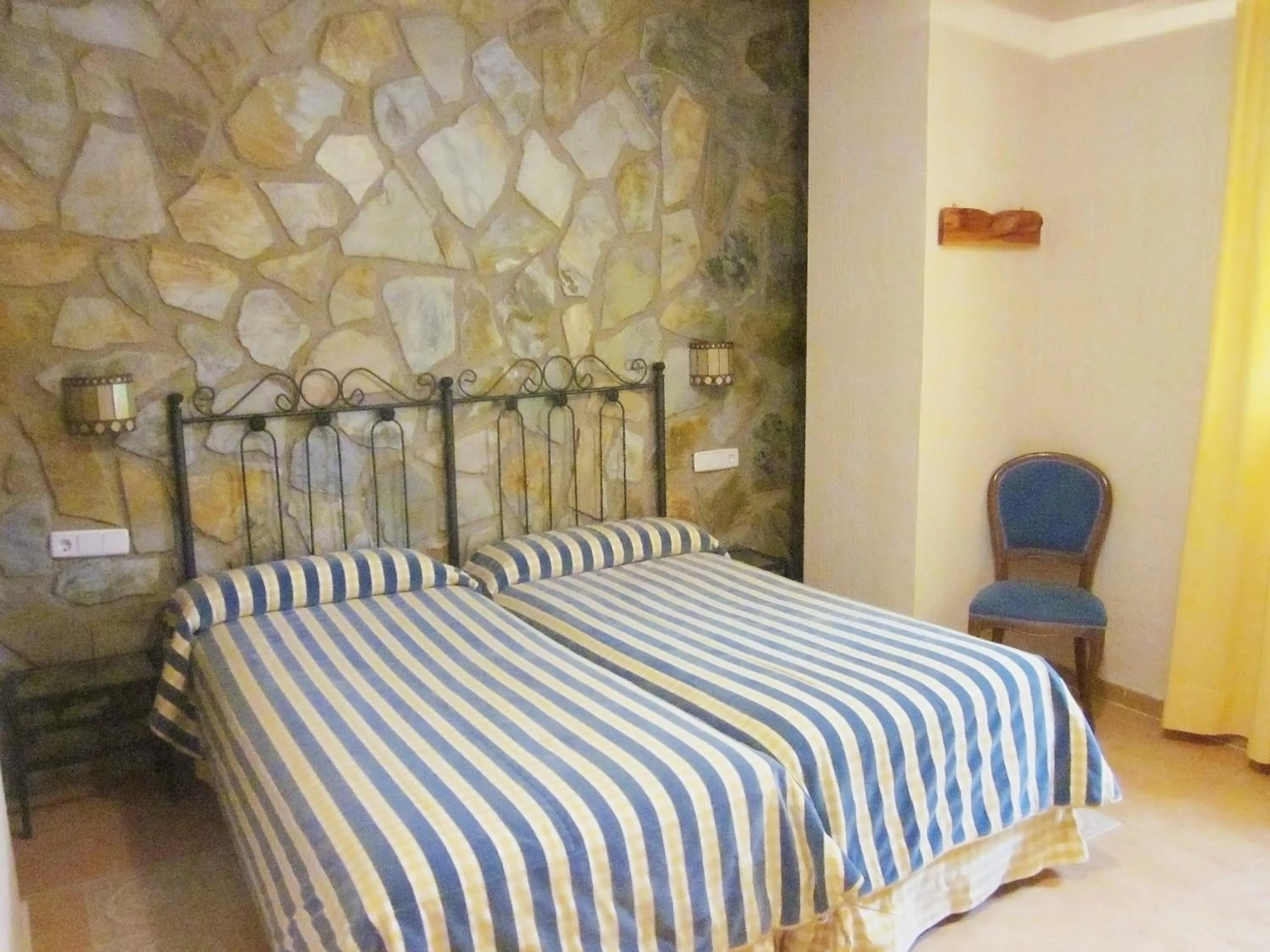 Bed in Hotel Rural Don Quijote