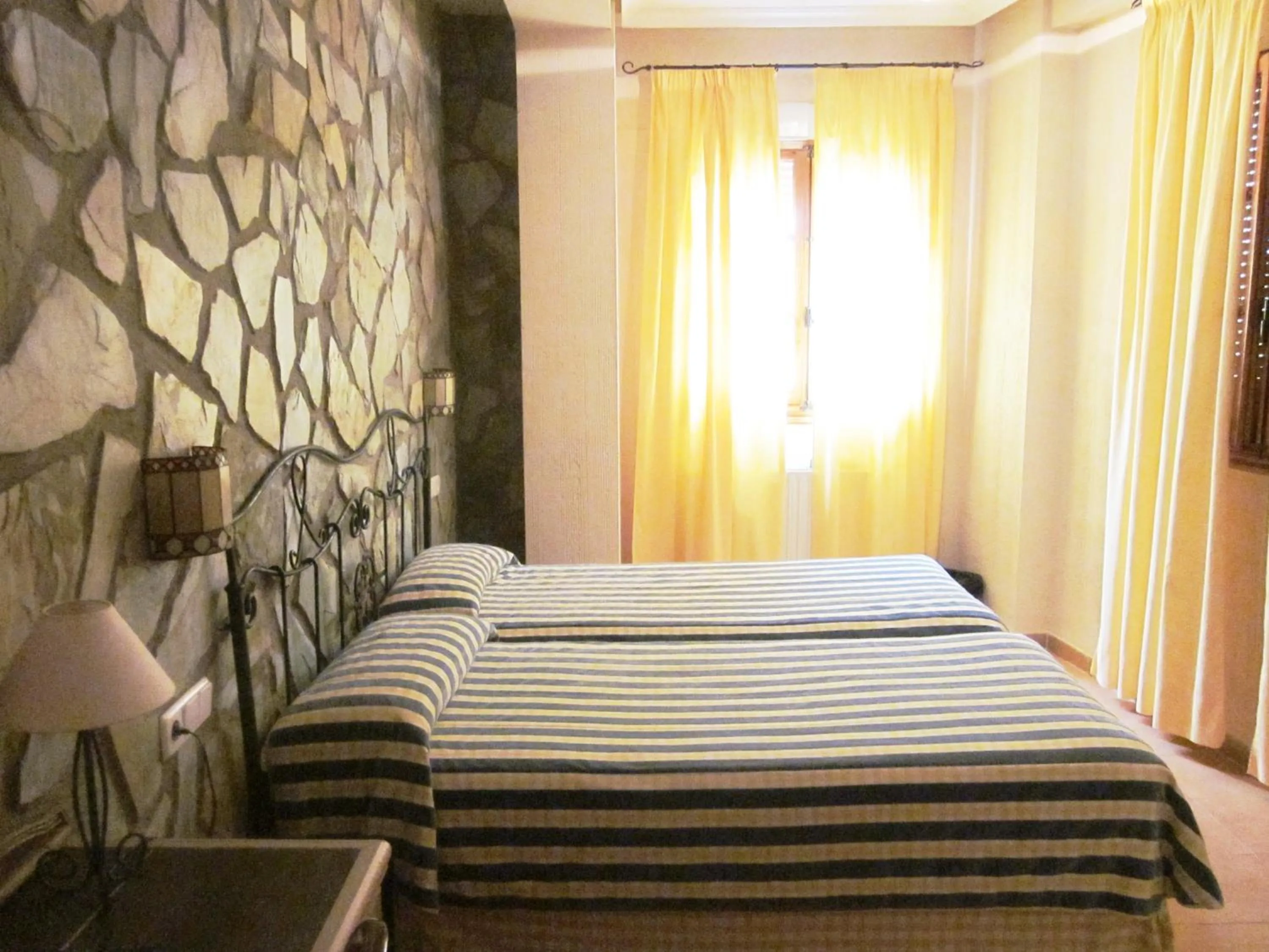 Bed in Hotel Rural Don Quijote