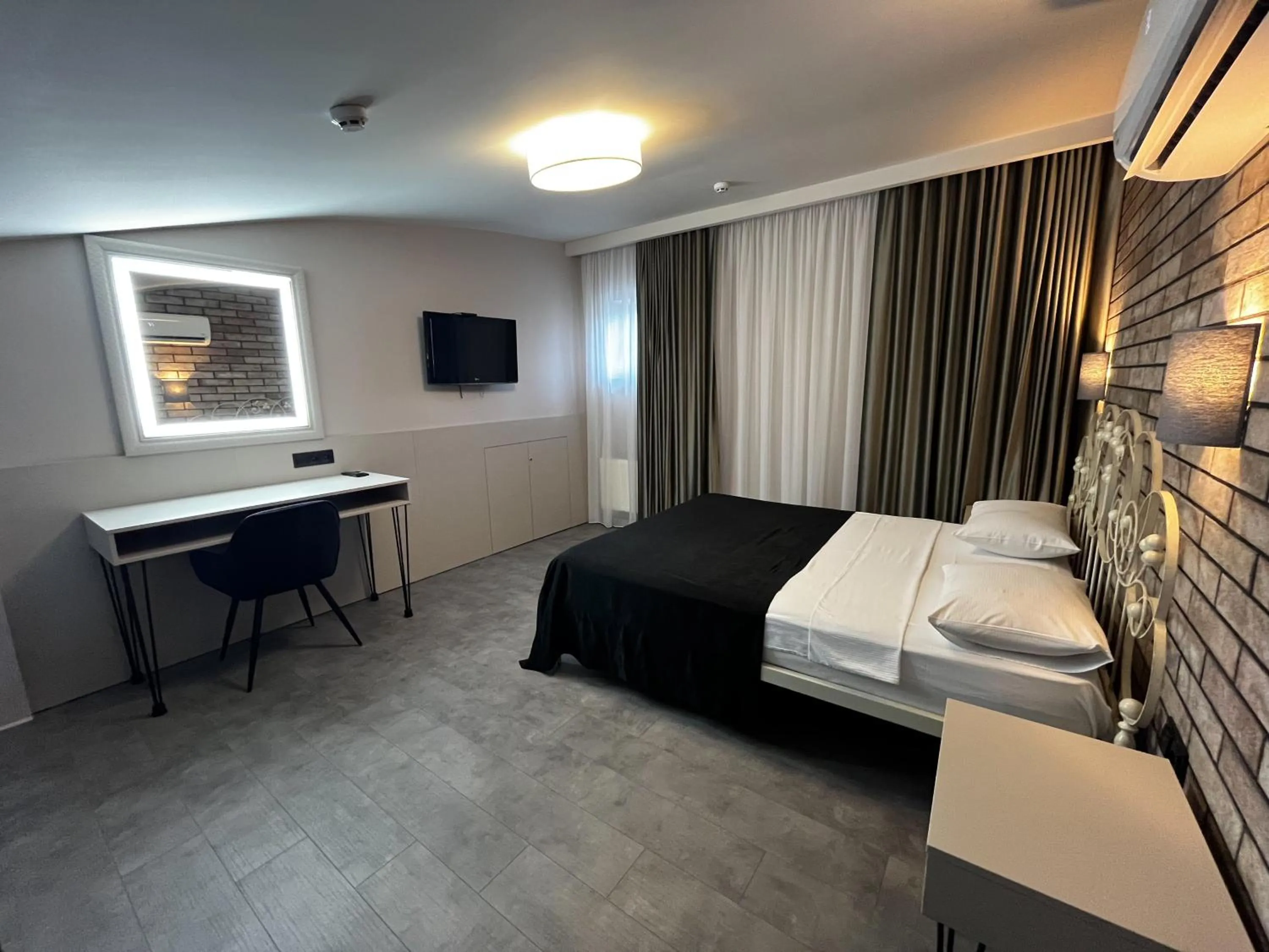 Bed in Komilfo Hotel