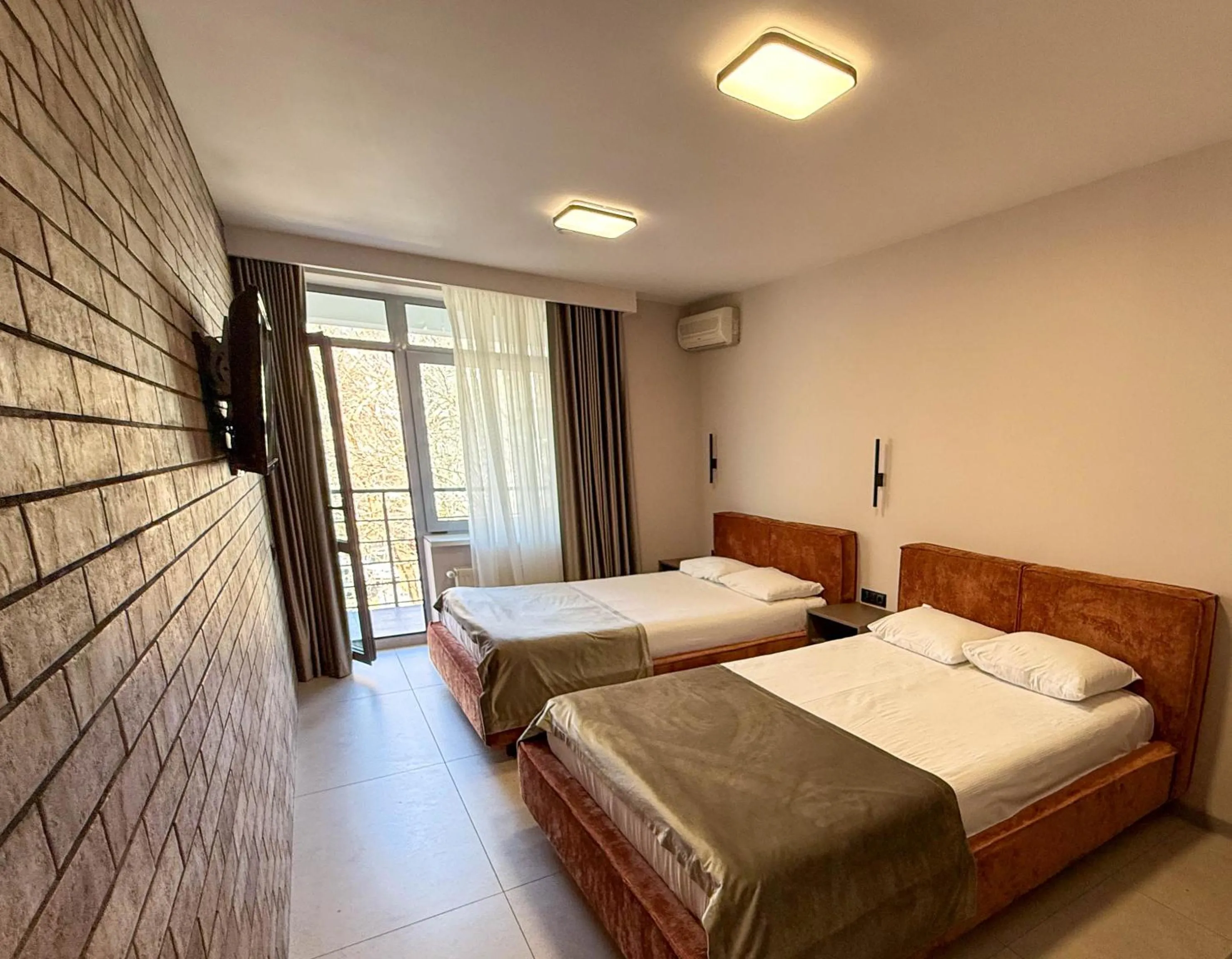 Bed in Komilfo Hotel