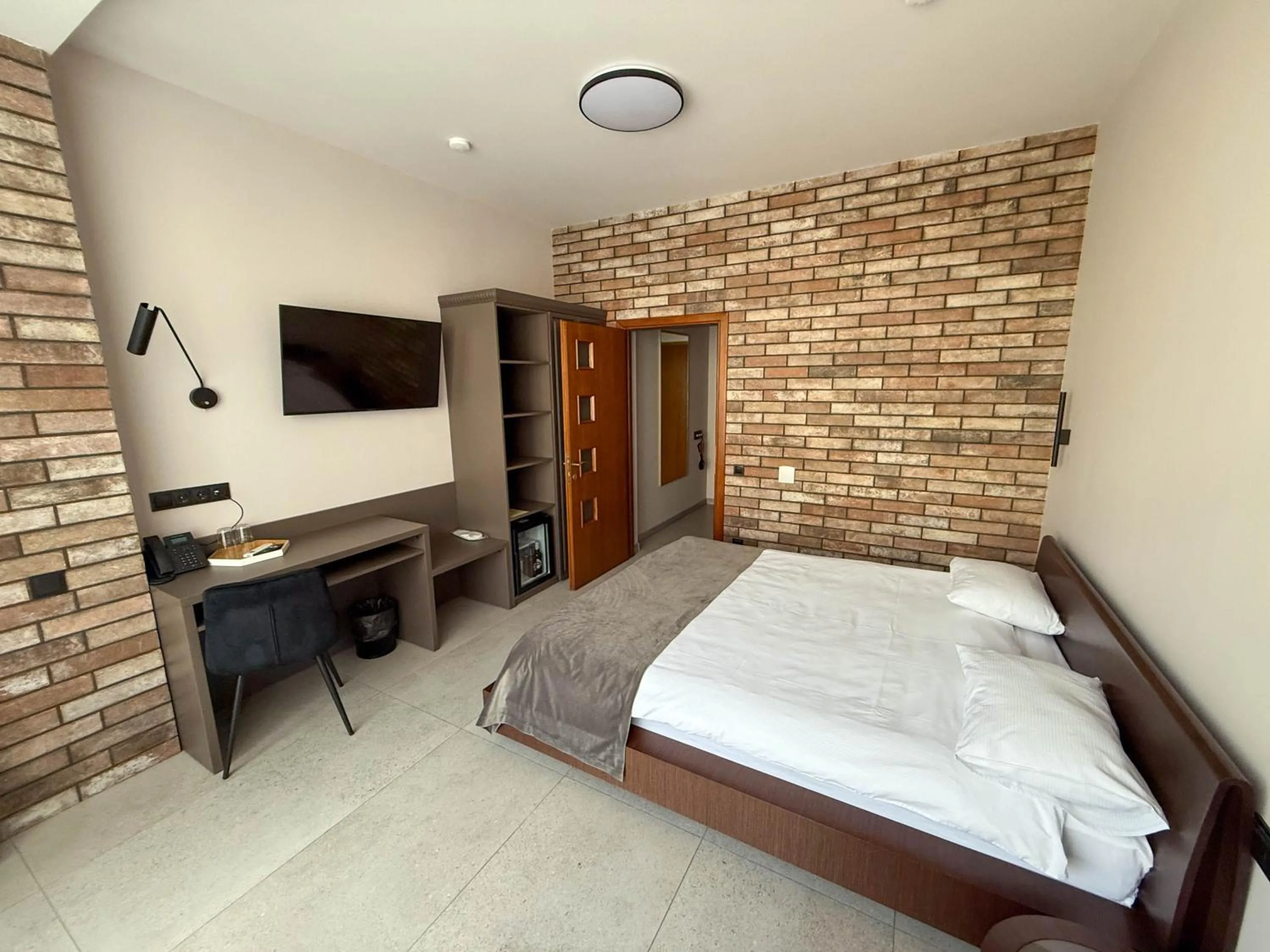 Bed in Komilfo Hotel