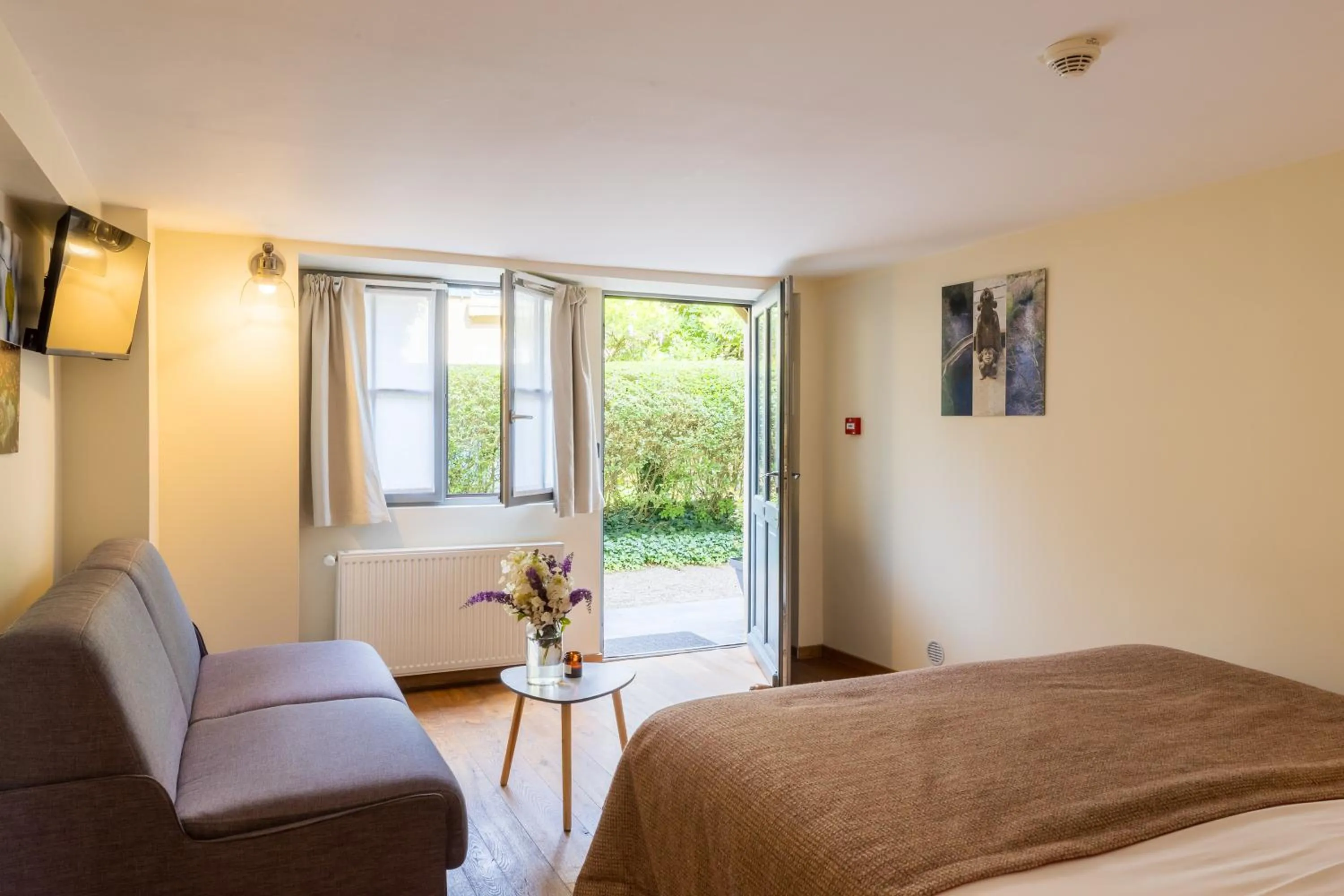 Photo of the whole room, Bed in Demeures et Châteaux Moulin des Templiers Hôtel & SPA