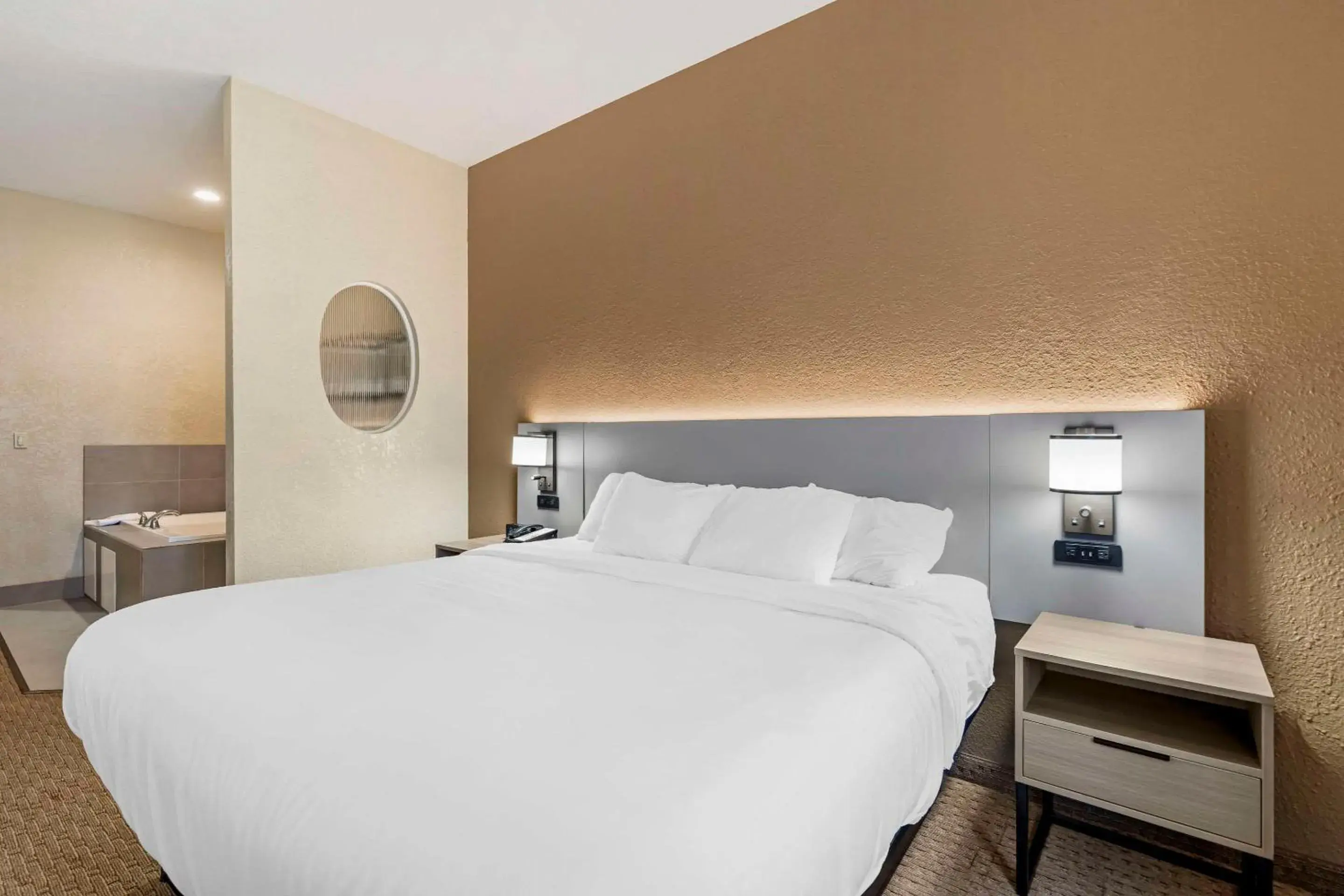 Bedroom, Bed in Comfort Suites Merrillville near US 30 Bedroom, Bed in Comfort Suites Merrillville near US 30