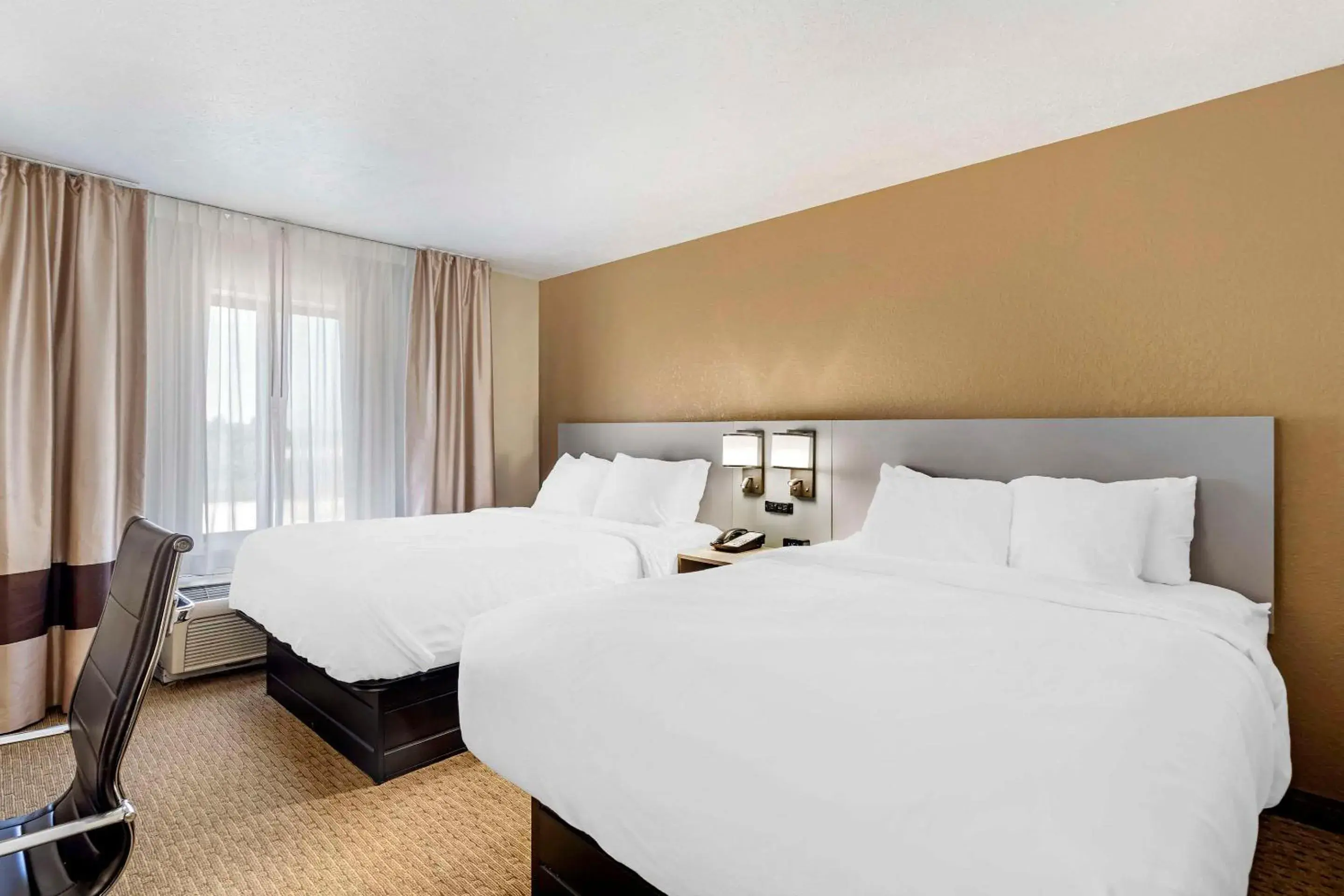 Bedroom, Bed in Comfort Suites Merrillville near US 30 Bedroom, Bed in Comfort Suites Merrillville near US 30