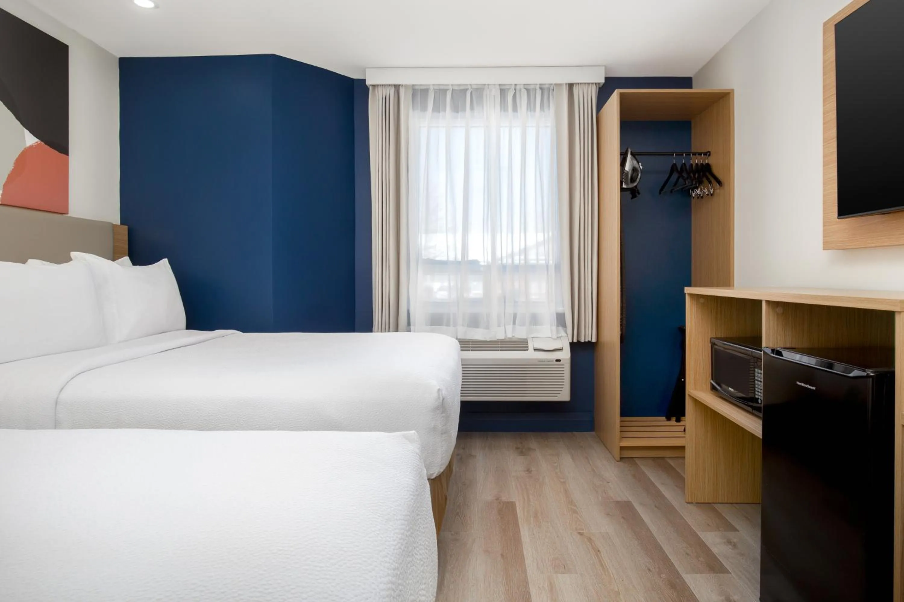 Bed in Brockville Inn and Suites