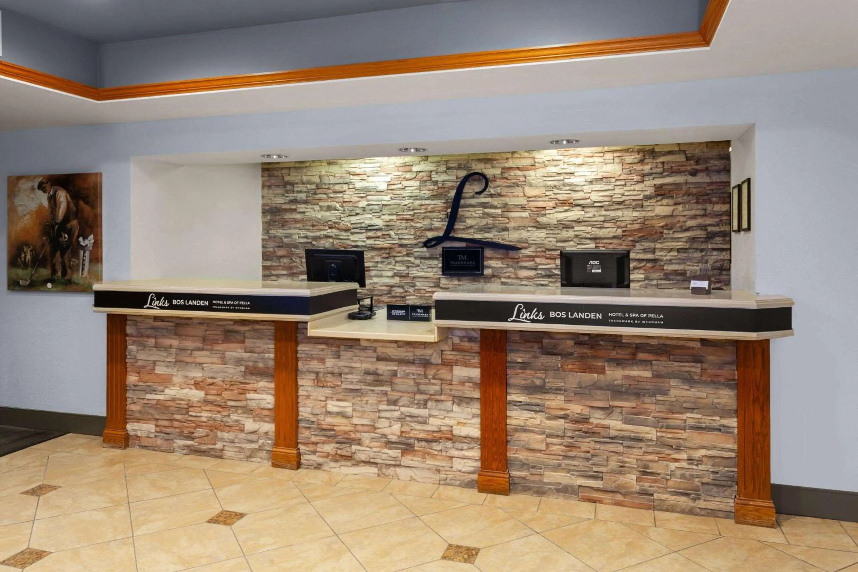 Lobby or reception in GrandStay Hotel & Suites Pella