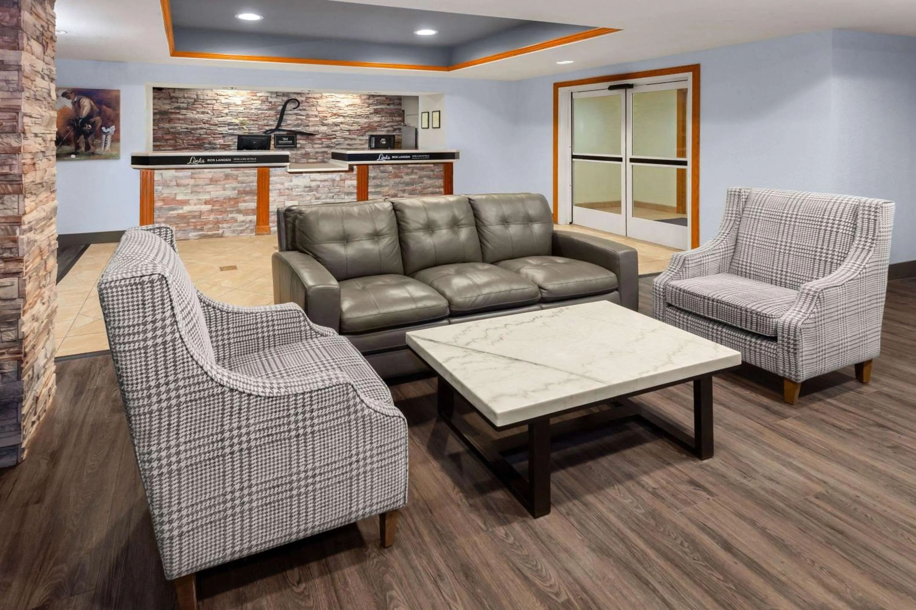 Lobby or reception in GrandStay Hotel & Suites Pella