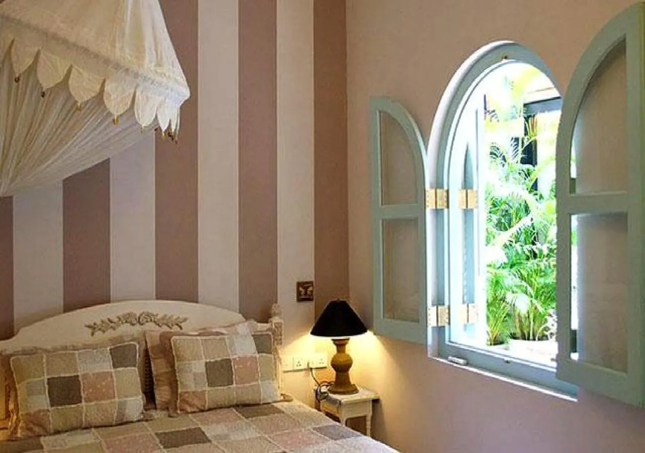 Photo of the whole room, Bed in LE JARDIN DU FORT - GALLE