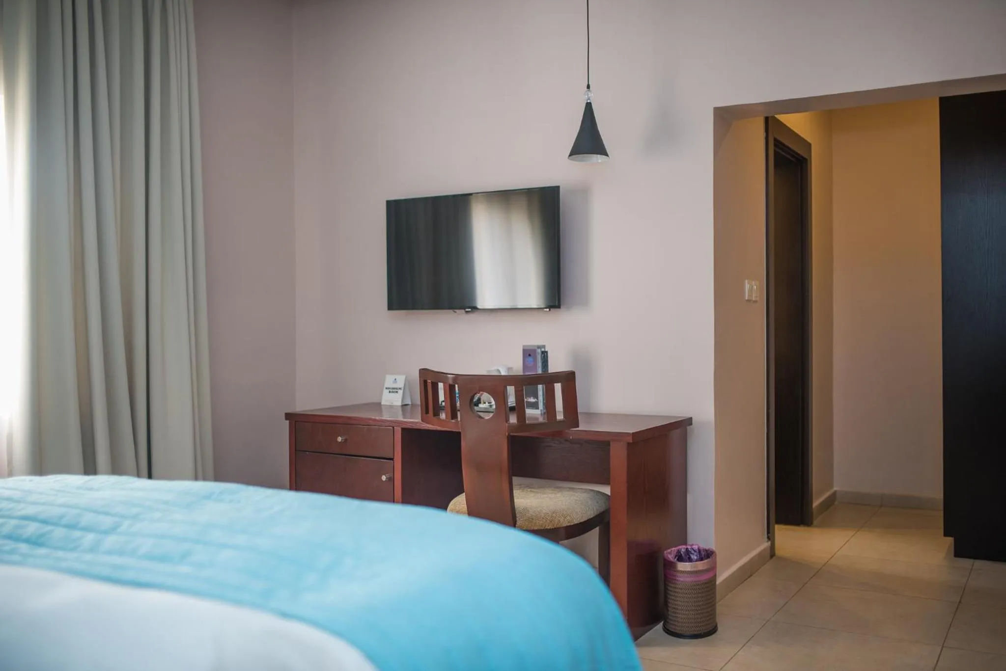 TV and multimedia, Bed in Ace Premier Hotel