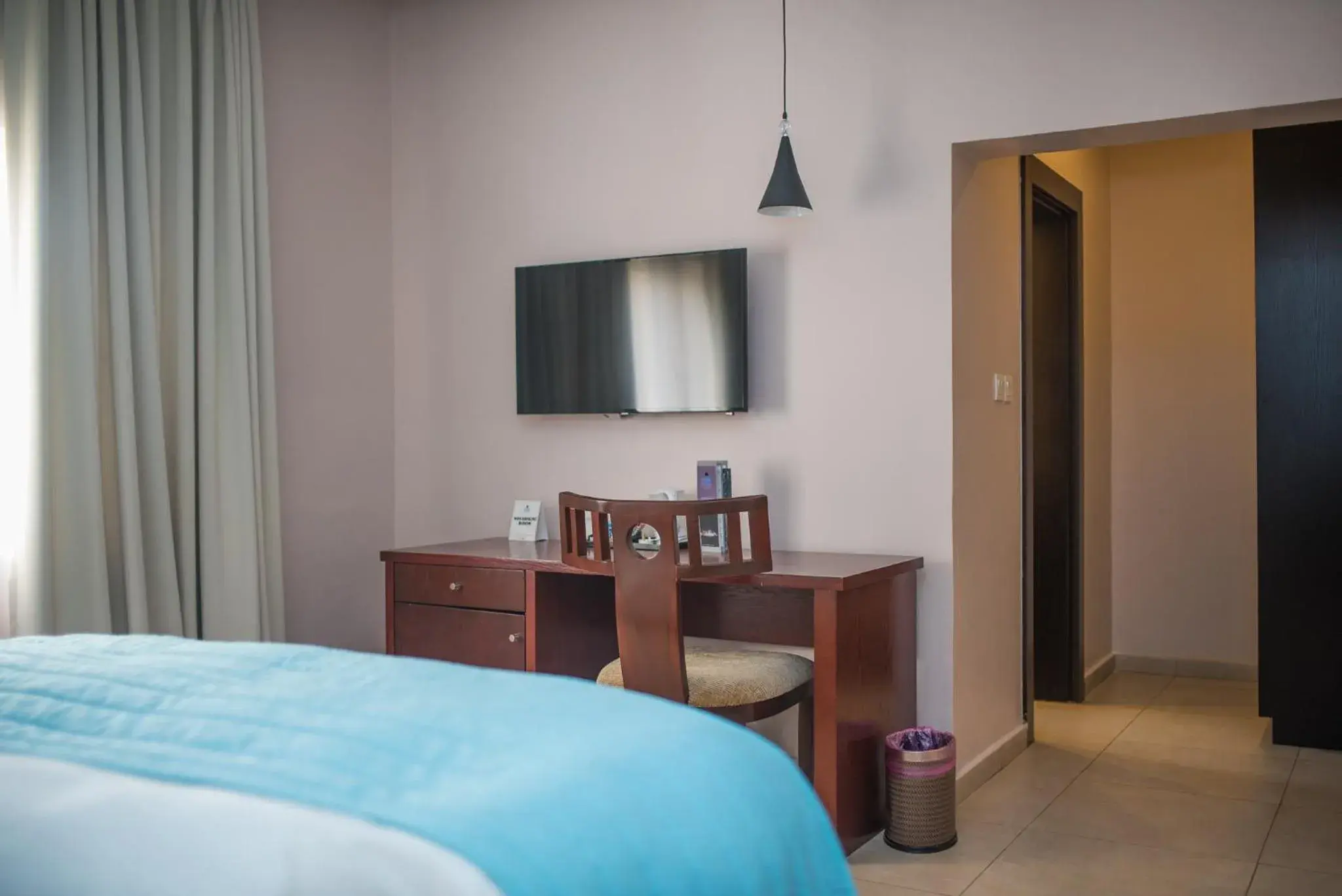 TV and multimedia, Bed in Ace Premier Hotel TV and multimedia, Bed in Ace Premier Hotel