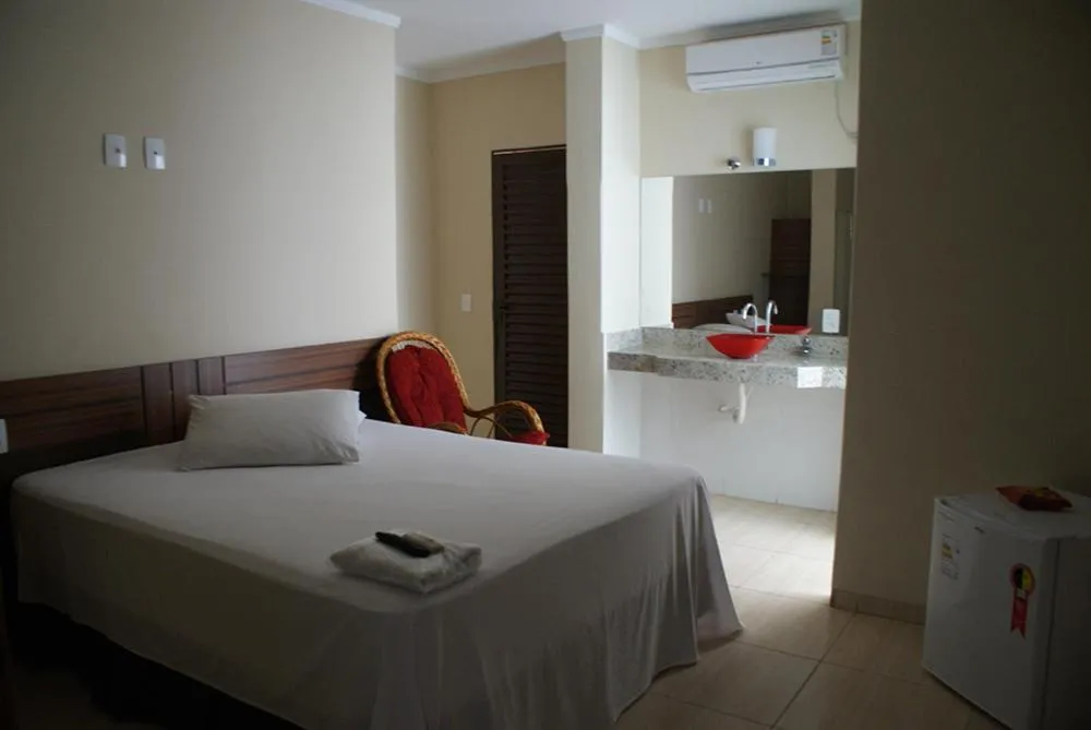 Bed in Colorado Plaza Hotel